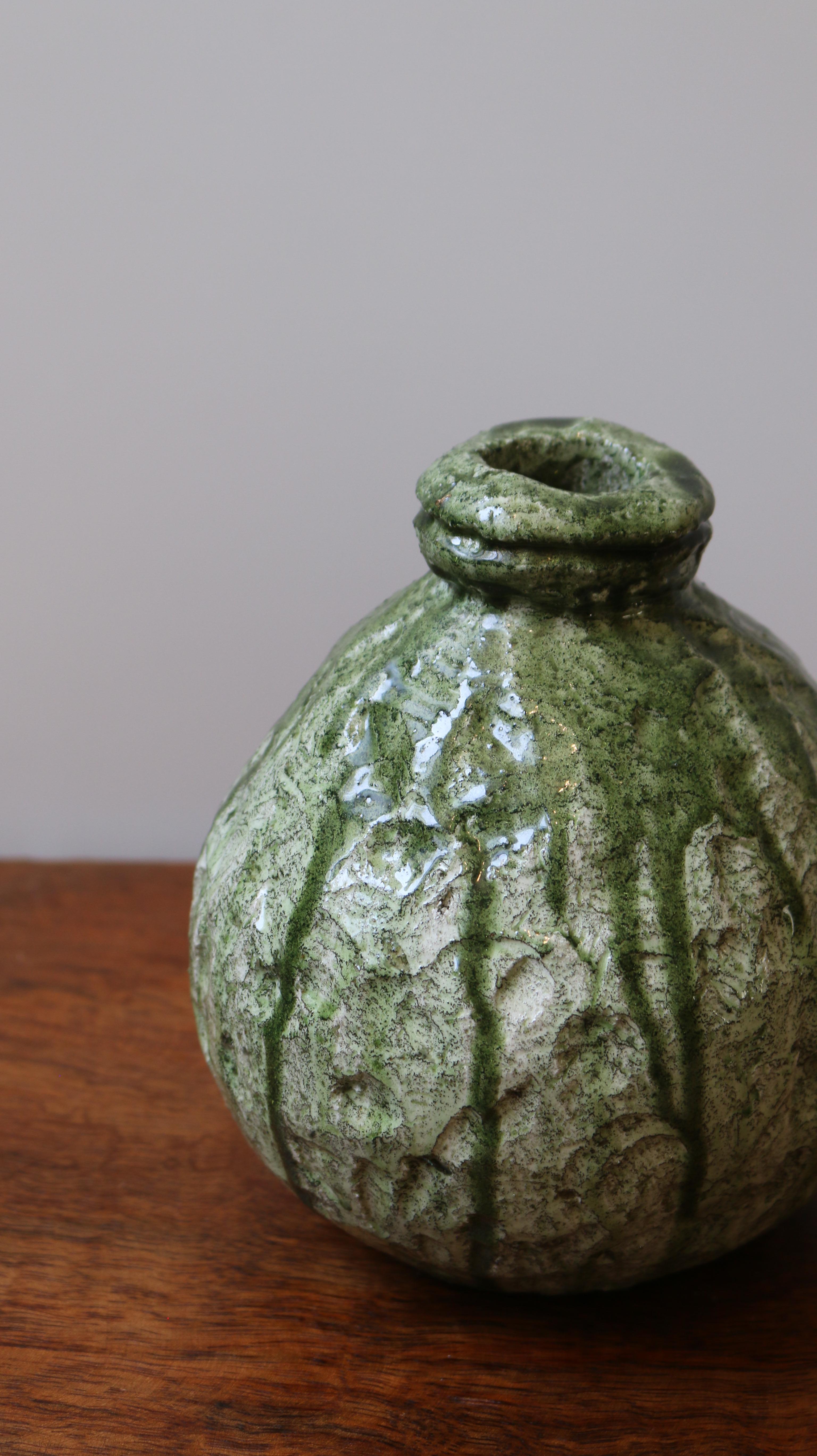 Crafted in solid stone and finished with a textured, hand-applied glaze, the Vase Collection evokes the quiet strength of ancient vessels with a distinctly contemporary spirit. Each piece is sculpted to celebrate organic imperfection — no two are