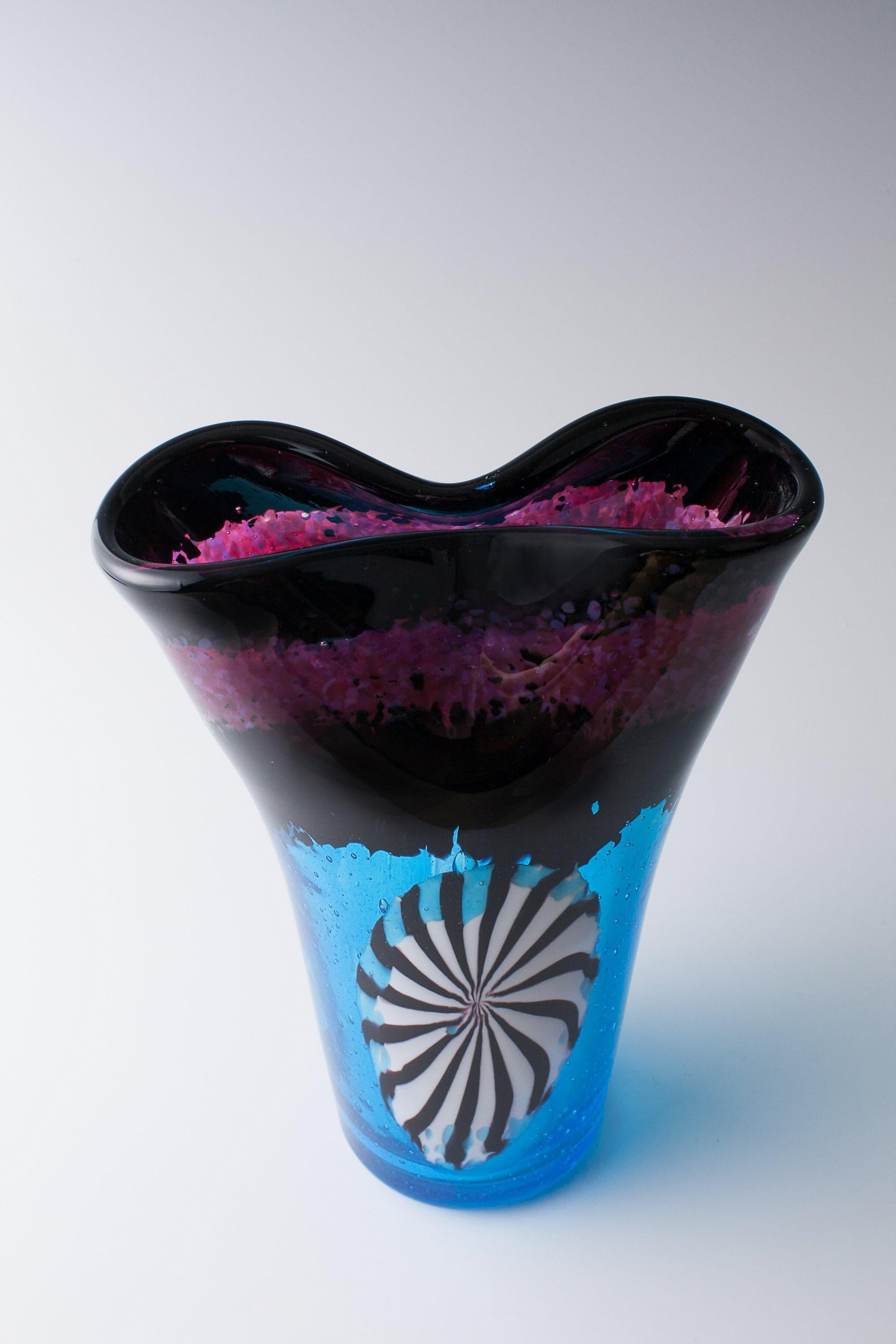 Dino Martens. 'Eldorado Vase. H. 24.7 cm. Designed in 1952. Made by Aureliano Toso. Clear cased glass with powder inclusions in raspberry blue, deep purple, white, aventurine, sky-blue and cobalt blue, star-shaped murrines of white and deep-purple