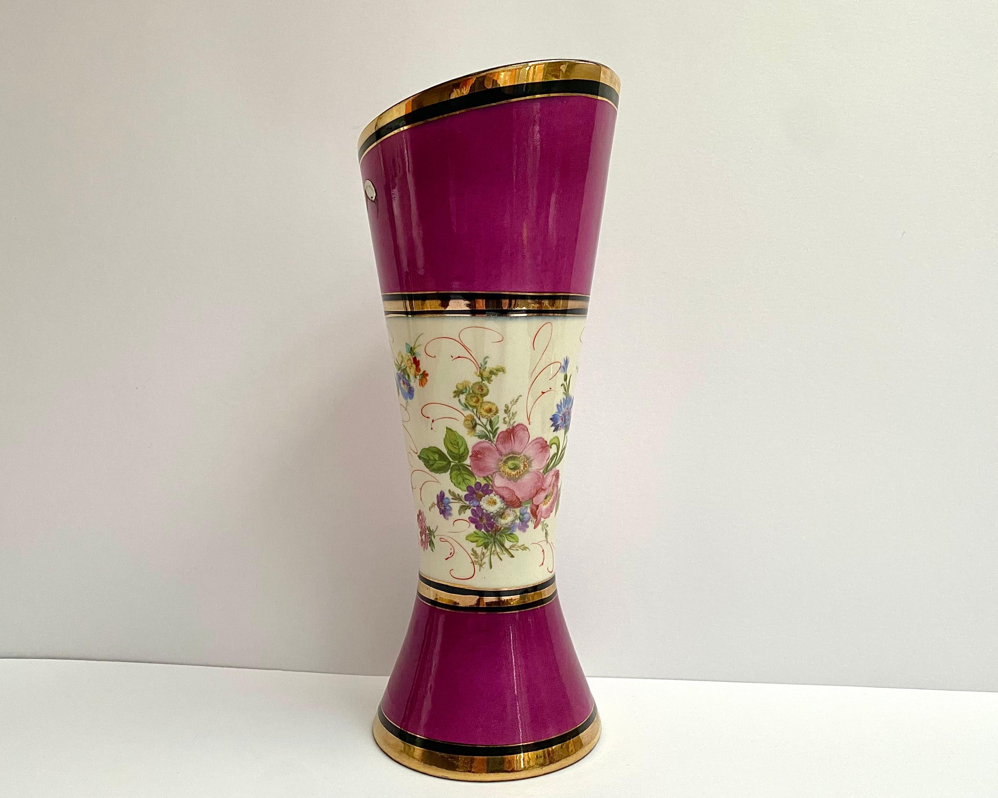 Vintage vase for flowers. The vase was made at the H. Bequet porcelain factory from hard faience. 

For decoration, an overglaze decal, hand-painted in gold, is used.  Manufactured in 1950s.

A porcelain vase with an exquisite floral pattern will be