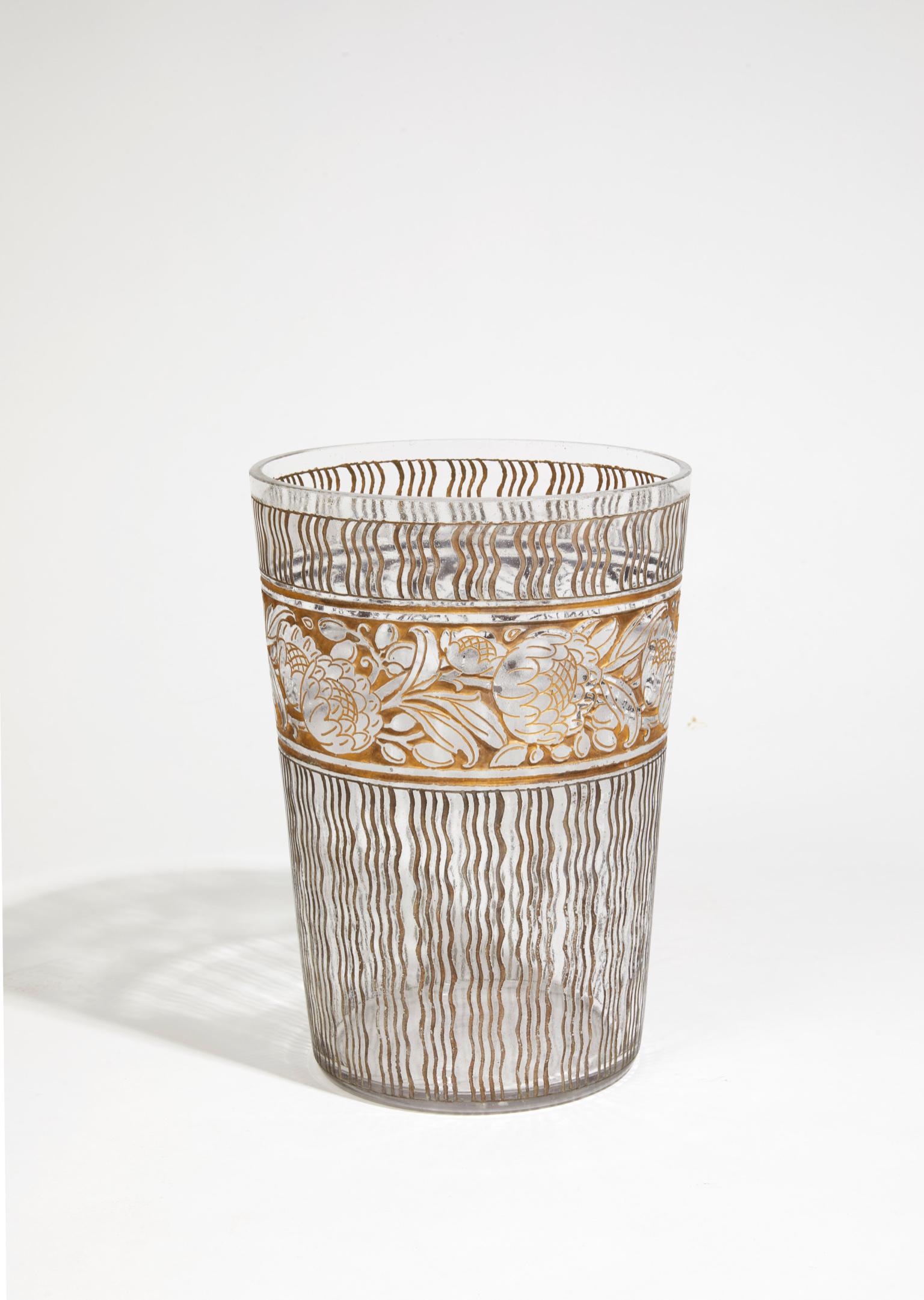 A glass vase with acid-etched decoration and rough golden background. Incised signature Daum Nancy.