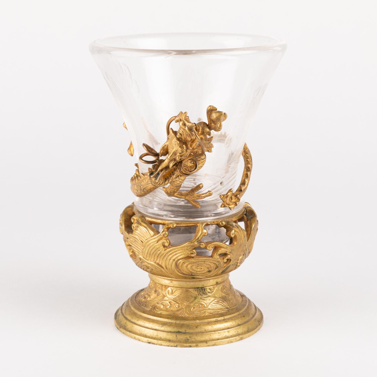 Crystal vase decorated with a gilded bronze dragon from the Maison de Cristal, Napoleon III period, 1880.
H: 17cm, D: 5.75cm