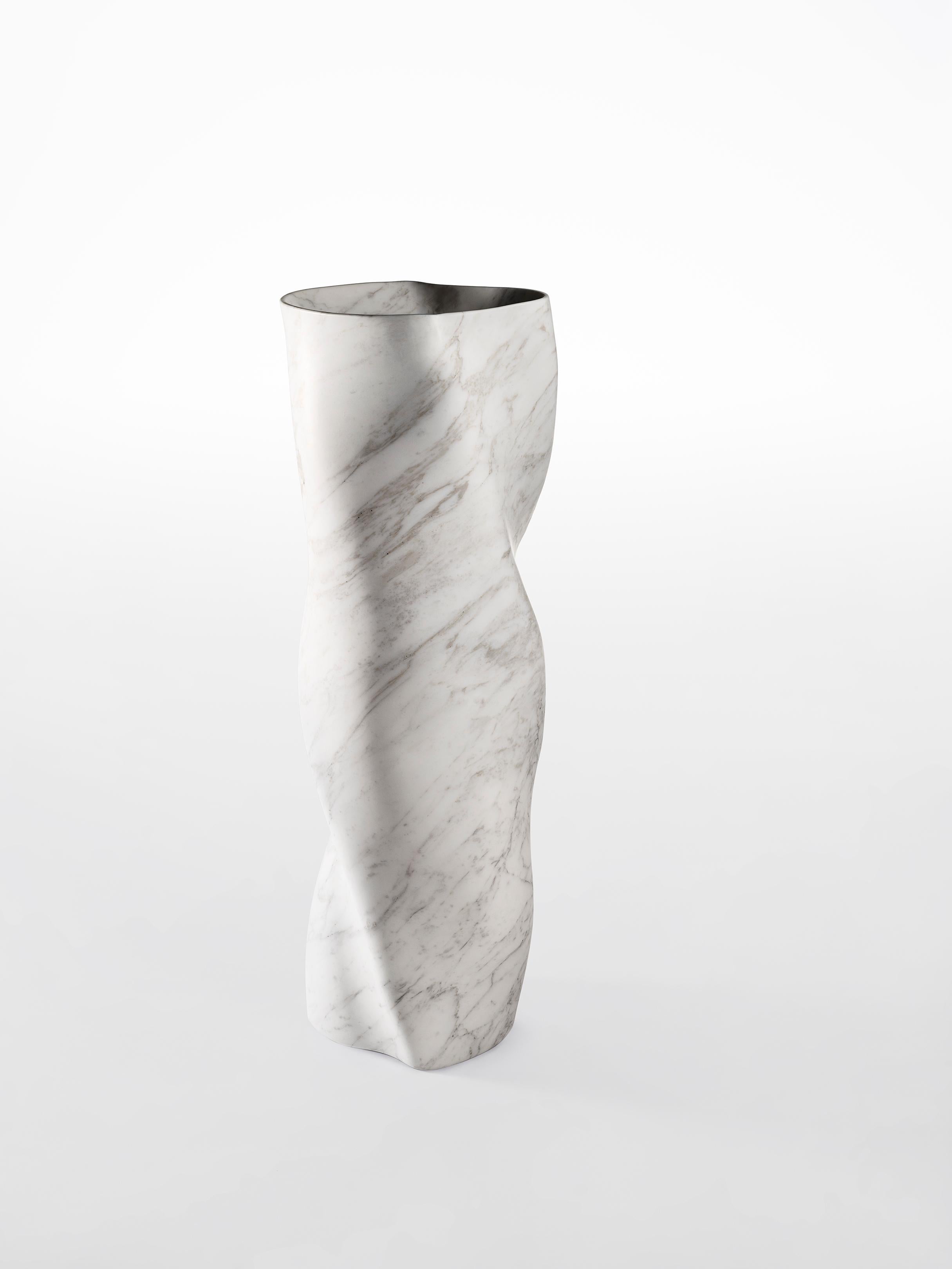 Vase II by Jonathan Hansen
12 Editions + 1 AP
Dimensions: 35 x 37 x H 102 cm
Materials: Calacatta Marble


SERIES I CAPTUM BIOMORFE is a group of nine sculpture works created by New York artist Jonathan Hansen. Captum is a seized or captured