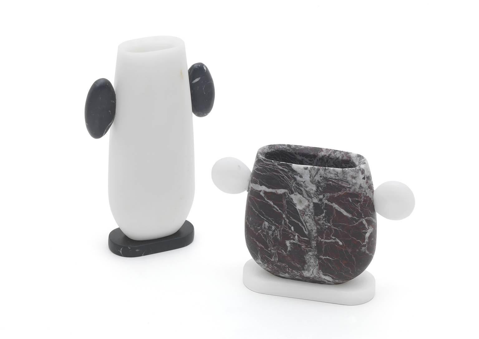 Pen or toothbrush holder, vase in White Michelangelo and Black Marquinia Marble.
Size: 11.7 x 4 x 17 cm, smooth finishing. Commercial name: Nardo, Homage Collection by the Italian designer Matteo Cibic. Made in Italy, hand finished.
This is not a