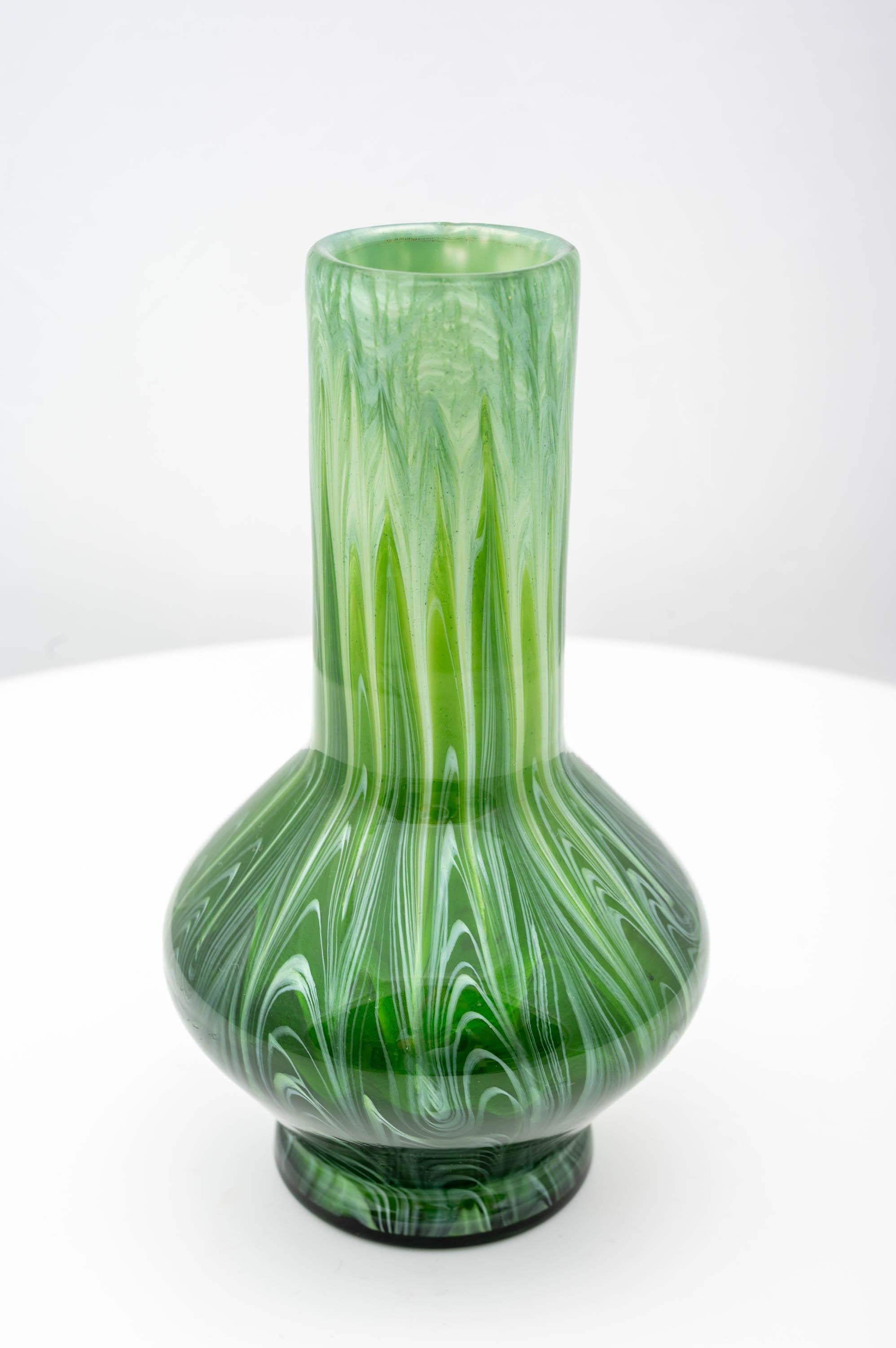 Bohemian glass vase, manufactured by Johann Loetz Witwe, Titania Genre 5032 decoration, ca. 1907, Viennese Art Nouveau, Jugendstil

Technique and material: glass, mould-blown and freeform

Bib.: A. Adlerova, E. Ploil, H. Ricke, T. Vlcek (ed.),