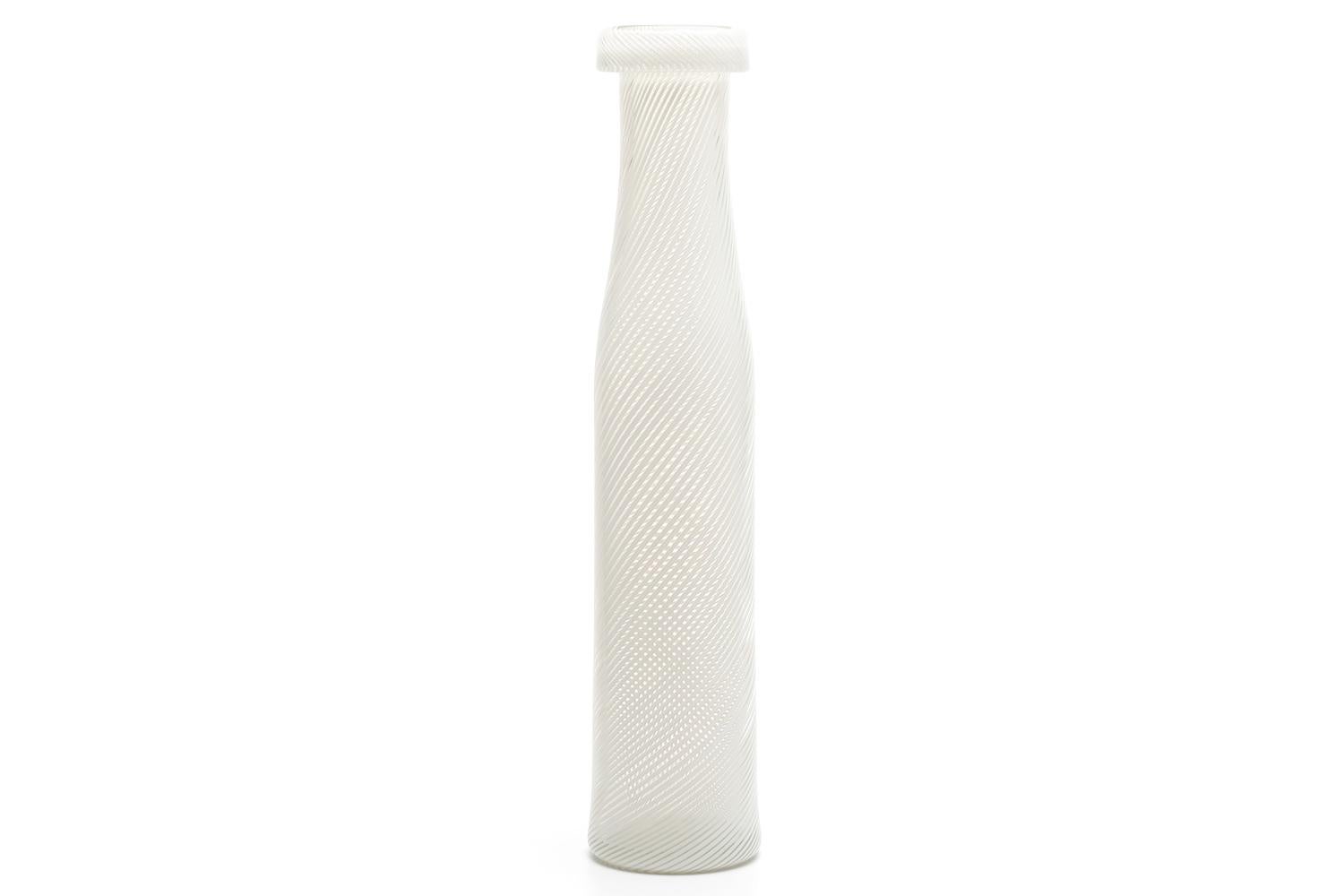 KF292 was designed between 1961 and 1962, and manufactured between 1963 and 1964.

Filigree glass, which was produced at Nuutajarvi in the late 1850s, was modelled on the techniques of Venetian glass.
The technique was discontinued, but Kaj Franck