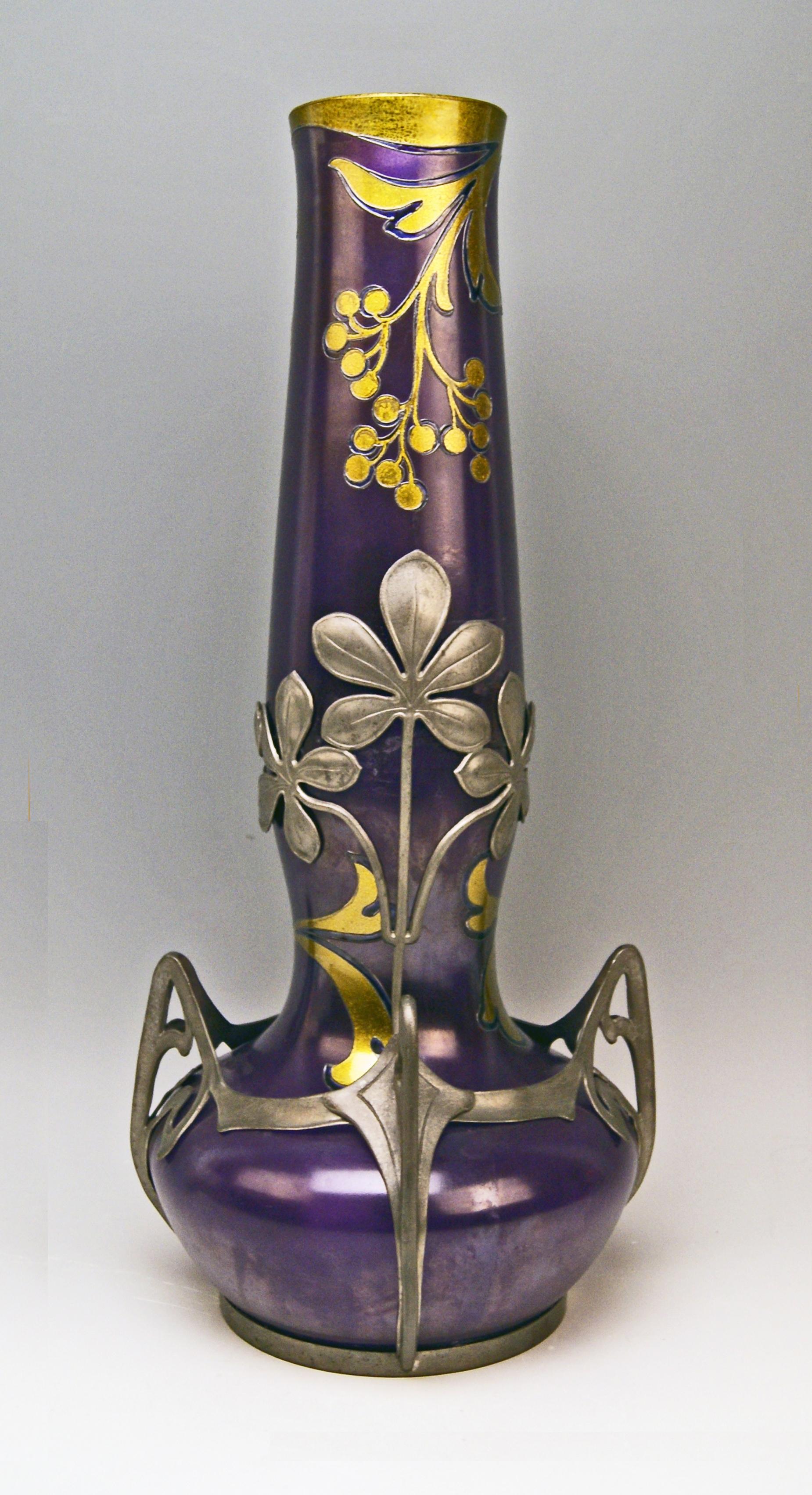 Superb as well as rarest Art Nouveau vase Loetz (Lötz) Widow Klostermuehle Bohemia.

Made by Loetz, Klostermuehle (Bohemia), circa 1902
Decor: PHAENOMEN GENRE TURMALIN 2/538
 
It is a most remarkable huge Loetz Vase of stalky type with bellied