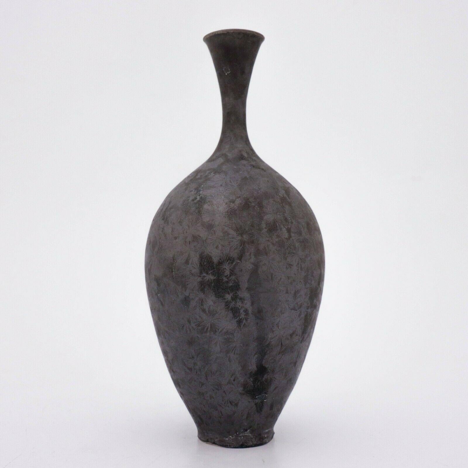 A unique vase in a matte gray crystalline glaze created by the contemporary Swedish artist Isak Isaksson in his own studio. The vase is 25 cm (10