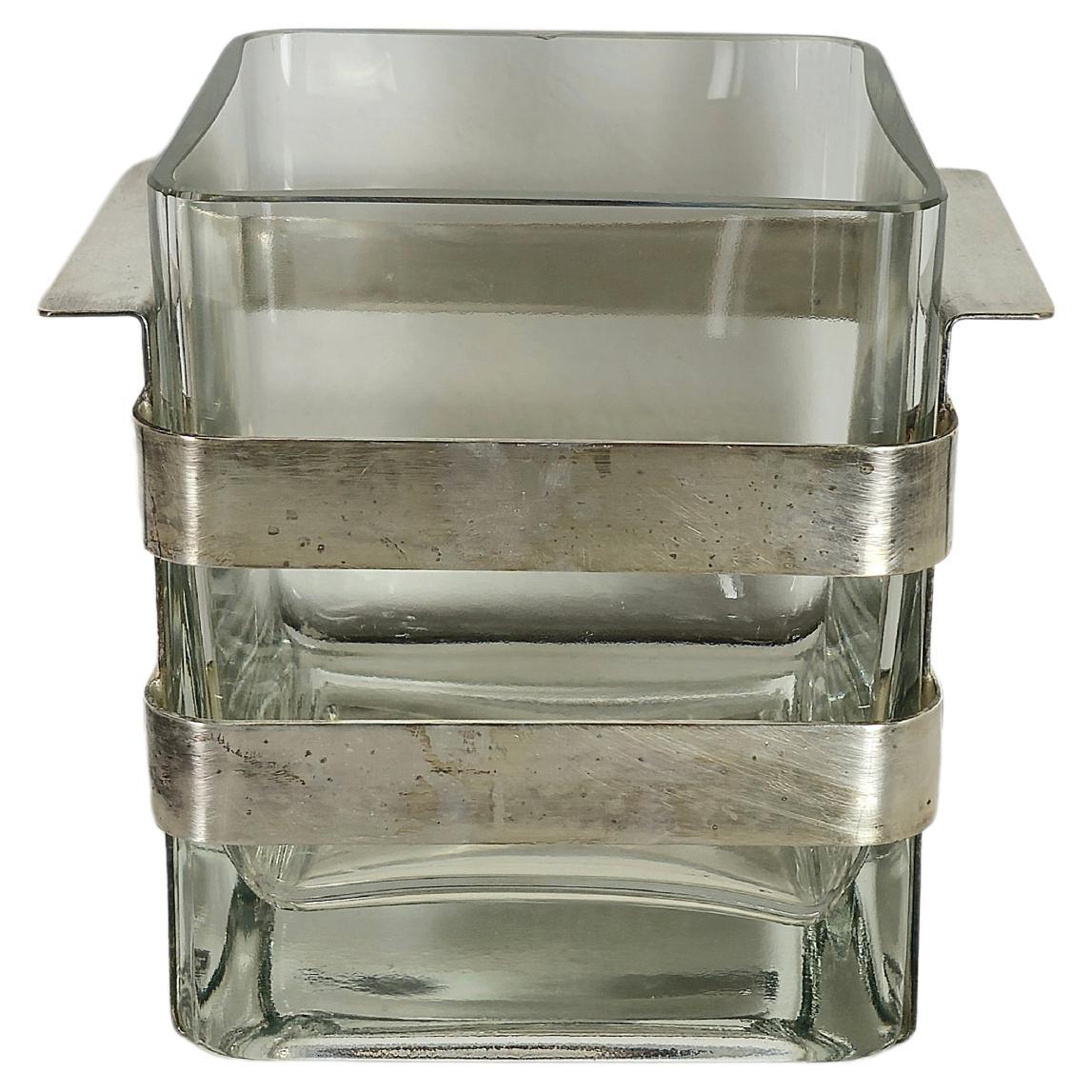 Vase/ice bucket made in Italy in the 70s.
Cubic-shaped vase in double transparent Murano glass with nickel-plated brass vase holder.


Note: We try to offer our customers an excellent service even in shipments all over the world, collaborating with