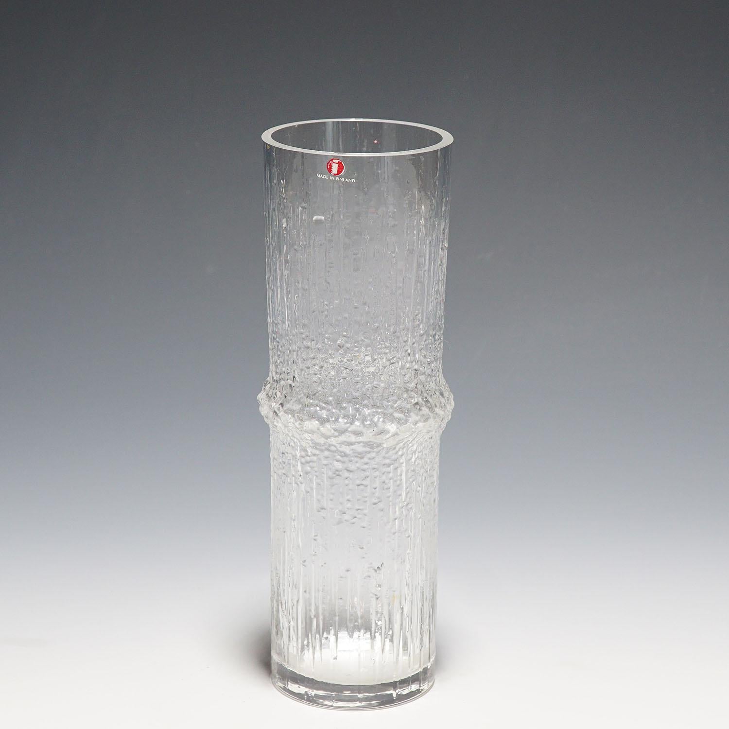 Vase 'Niva' by Tapio Wirkkala for Iittala, Finland 1970s

A vintage 'Niva' (Rushing stream) vase designed by Tapio Wirkkala for Iittala Glassworks in 1973. Mold blown crystal clear glass, marked with incised signature 'TW' on the base. An authentic