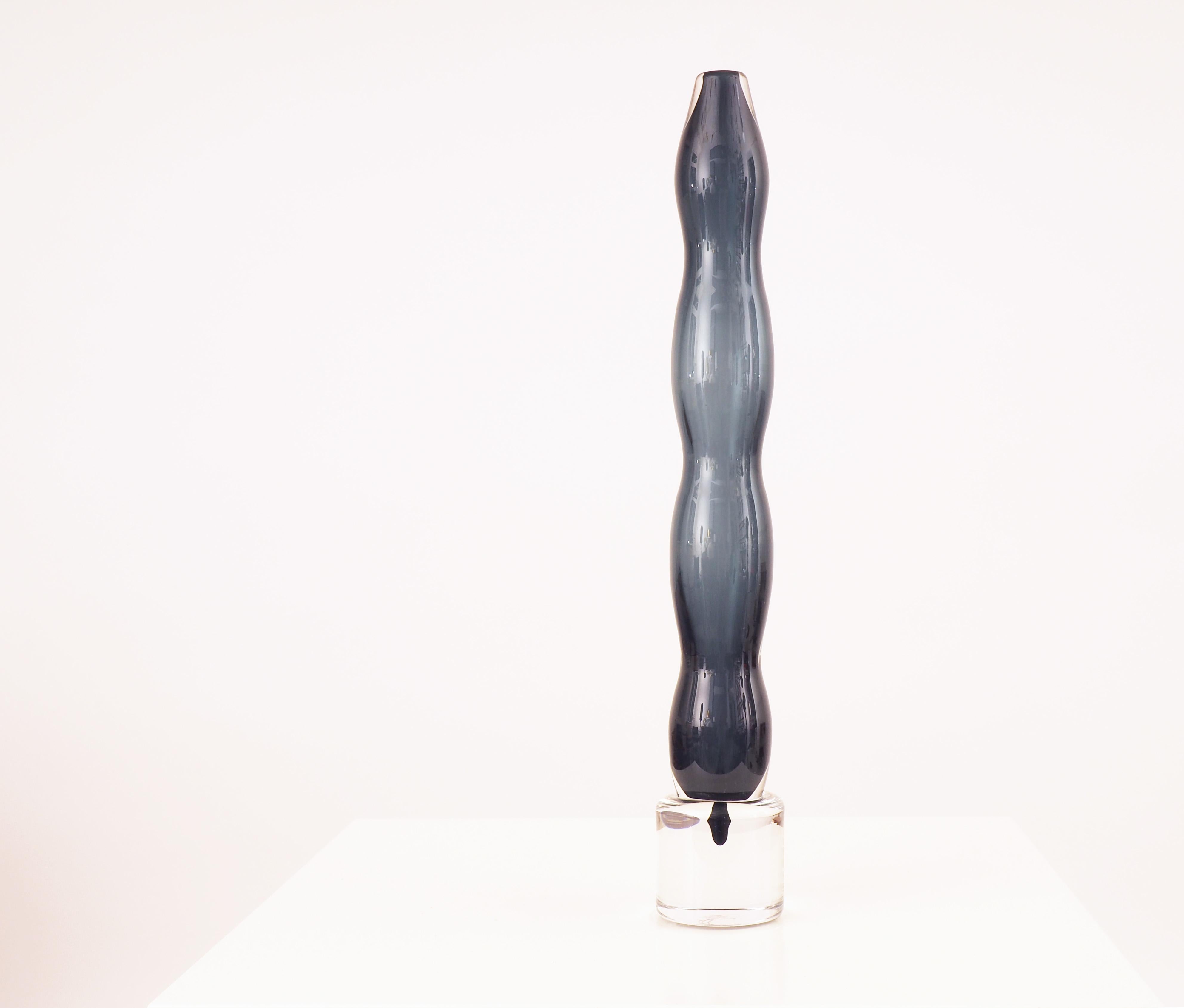 Tall glass vase or sculpture designed by Matz Borgström and blown attributed to Orrefors, 1988.

Signed 907379 Matz Borgström 24-50, Orrefors Gallery-88.