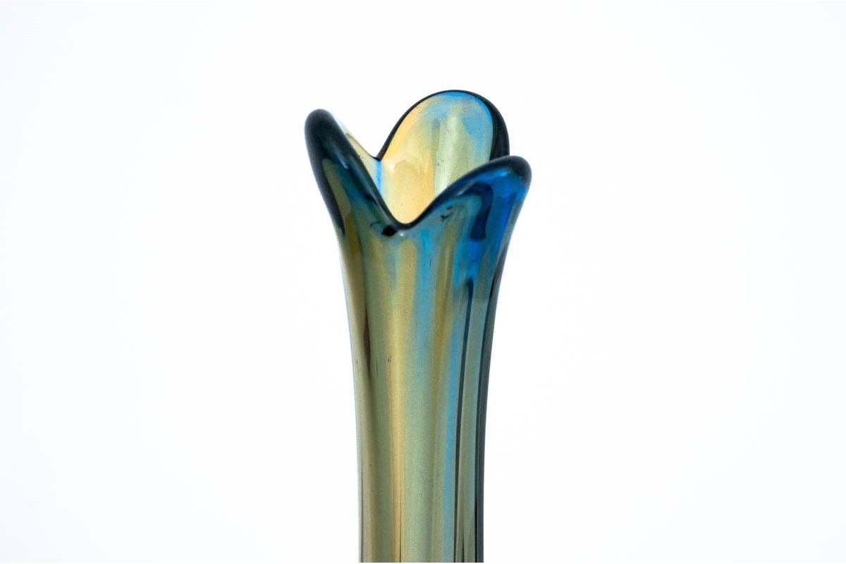 70s glass vase

Dimensions: Height 32 cm / dia. 6.5 cm.