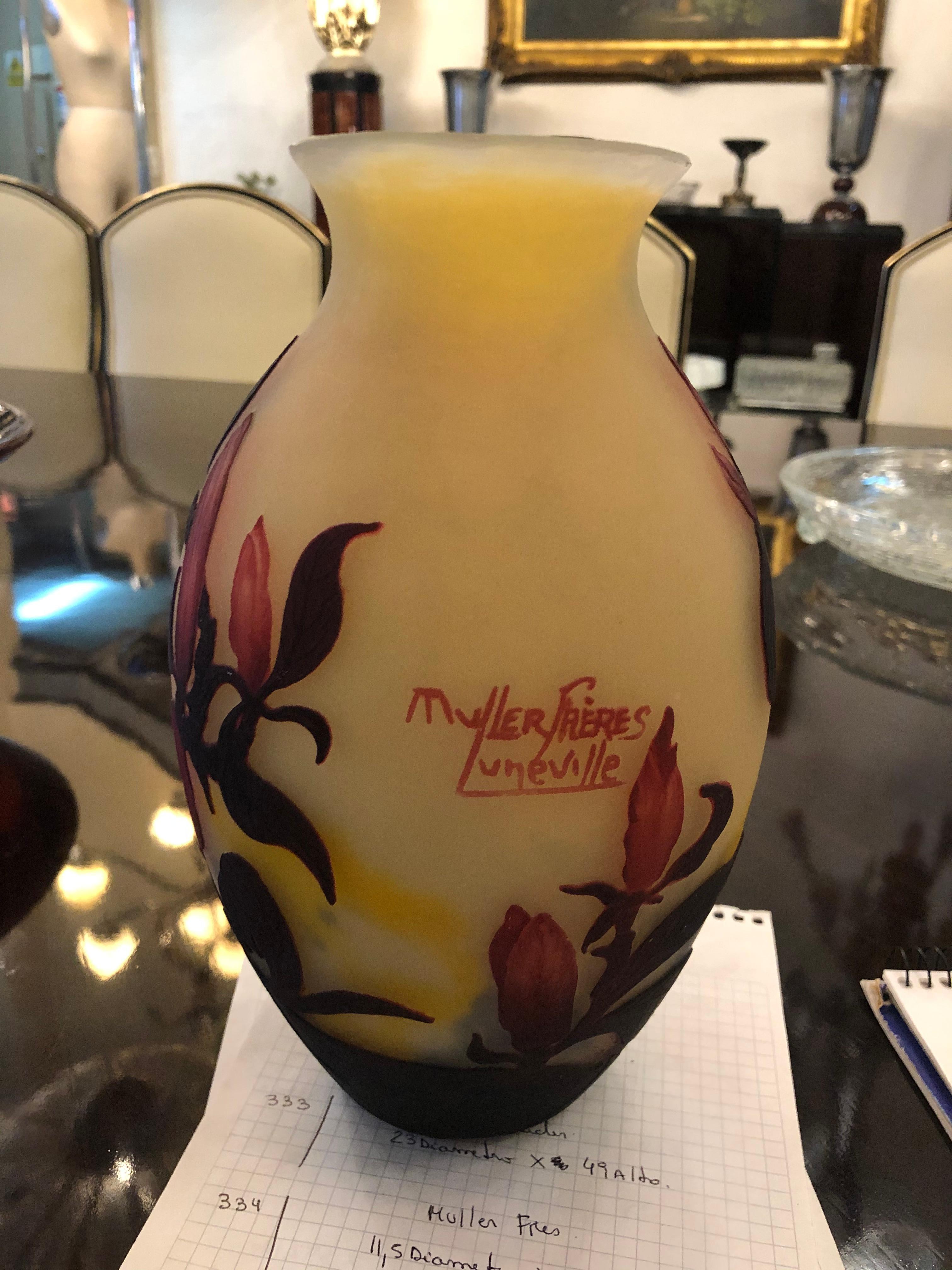 Vase Sign: Muller Freres Luneville
acid worked
Muller Feres
The heart of the company was formed by five brothers (Henri, Desire, Eugene, Pierre, Victor) from a glass making family who trained and worked at the Galle factory. Henri set up a