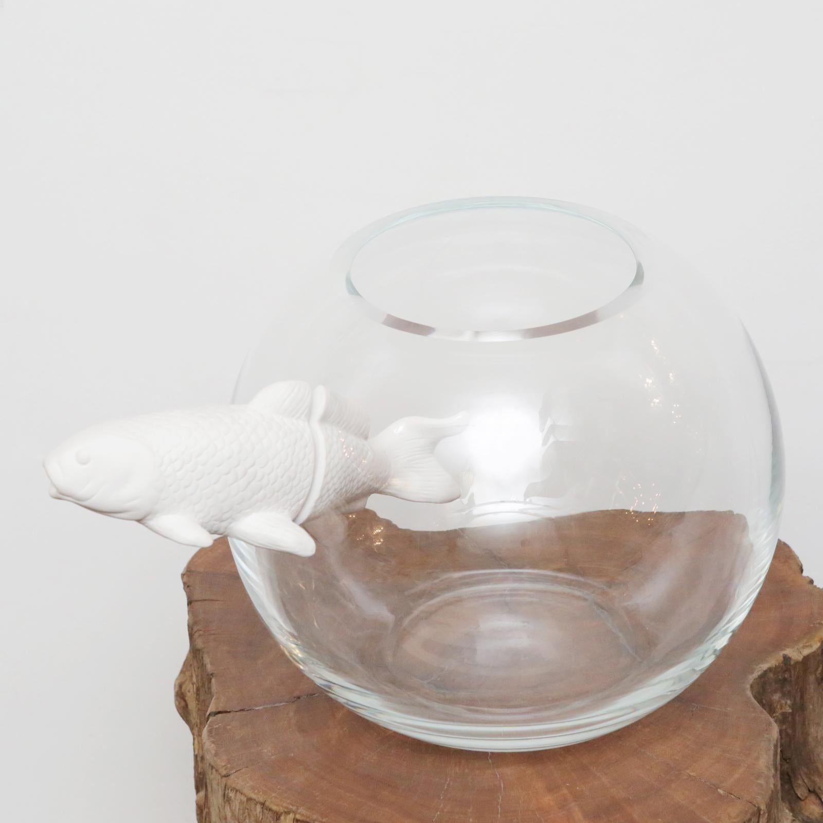 Vase white fish with clear glass and
fish in white ceramic.