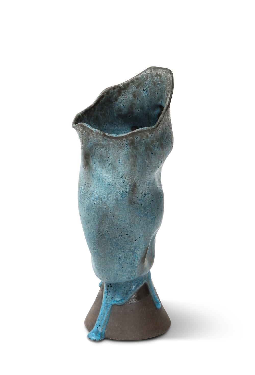 Vase with cone foot by David Haskell. Ceramic vase with blue glazes. Artist signed on underside.