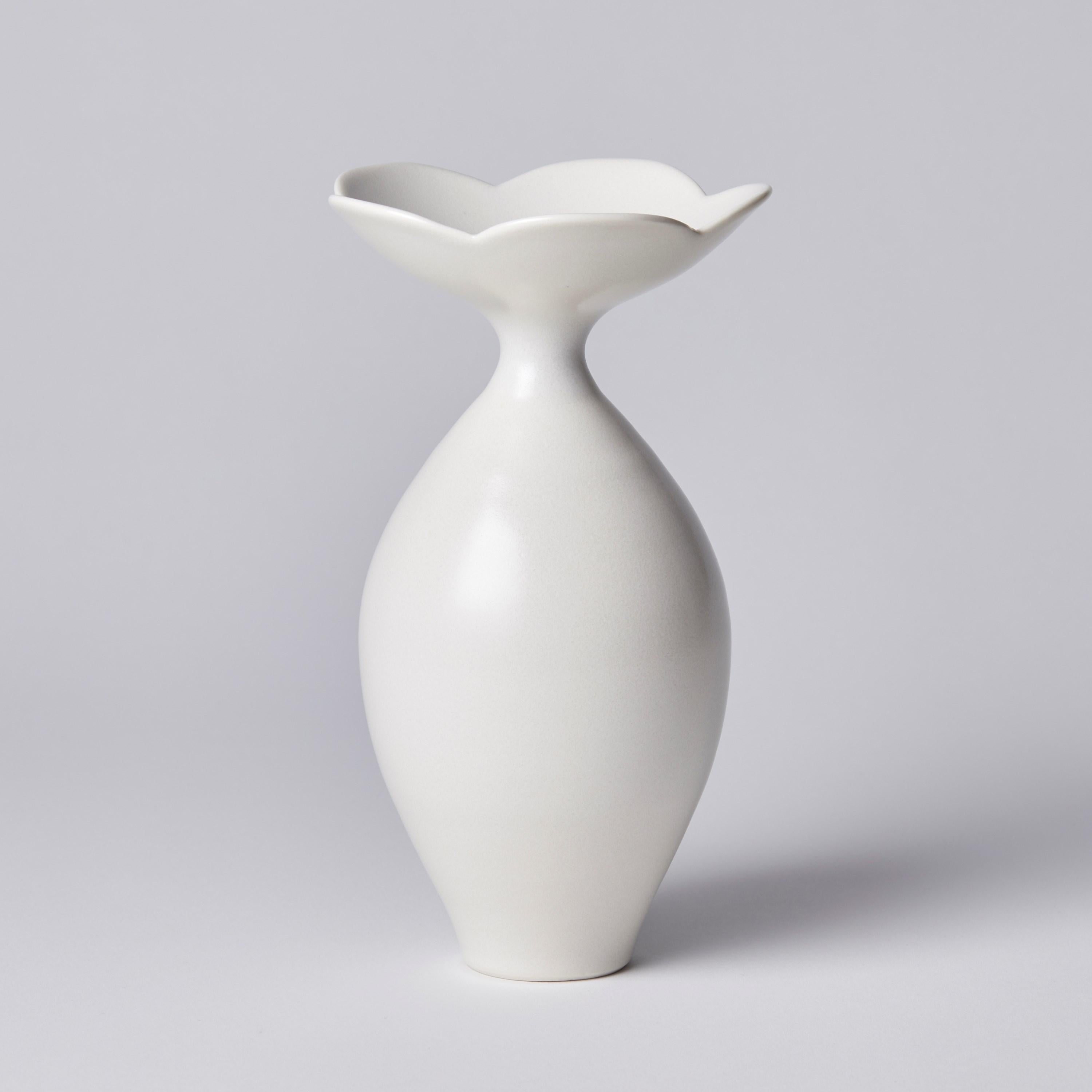 ‘Vase with Foliate Rim I' is a unique porcelain sculptural vessel by the British artist, Vivienne Foley. 

Vivienne Foley is based in Gloucestershire where she produces exquisite ceramic sculpture. Although in essence they are often functional