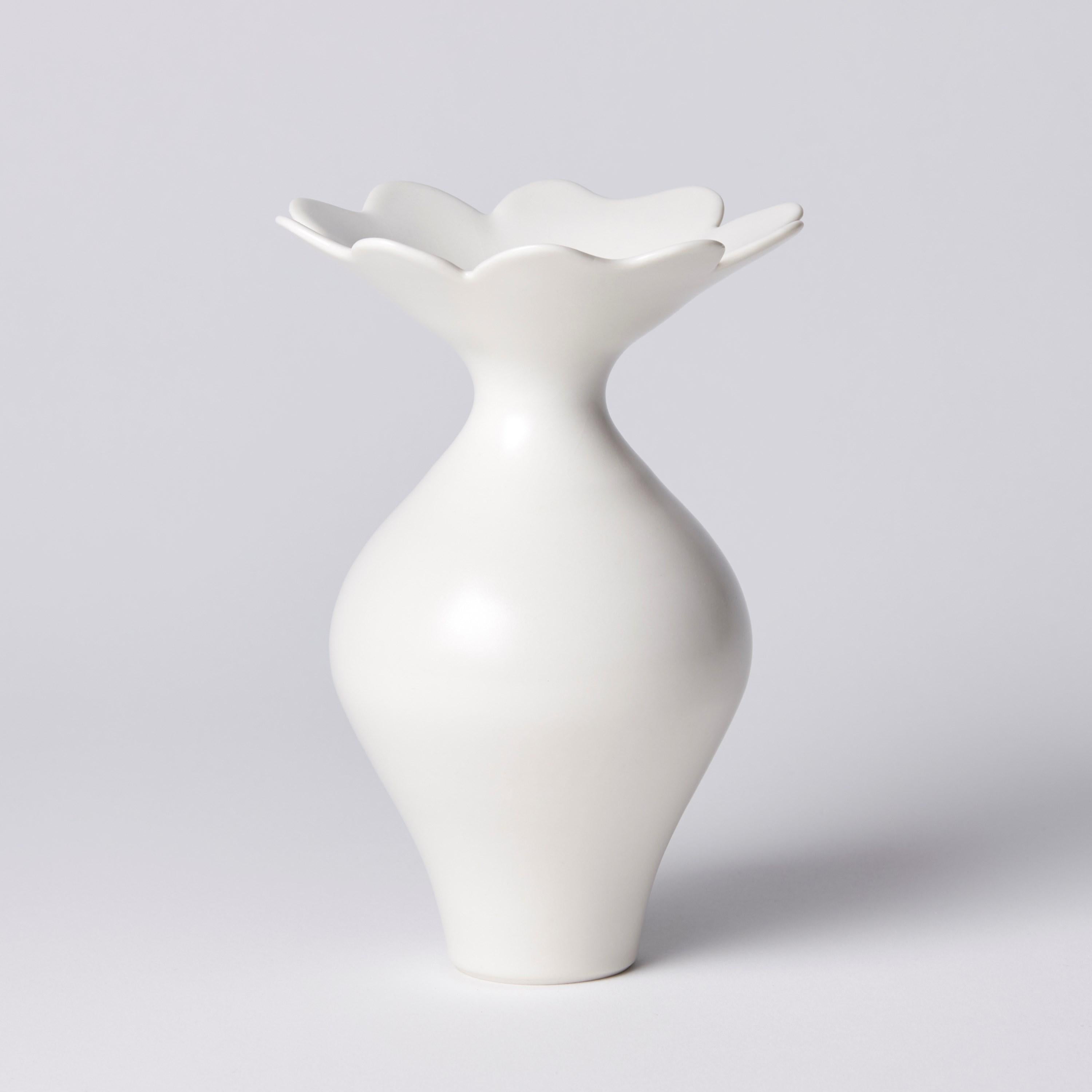 ‘Vase with Foliate Rim II' is a unique porcelain sculptural vessel by the British artist, Vivienne Foley. 

Vivienne Foley is based in Gloucestershire where she produces exquisite ceramic sculpture. Although in essence they are often functional