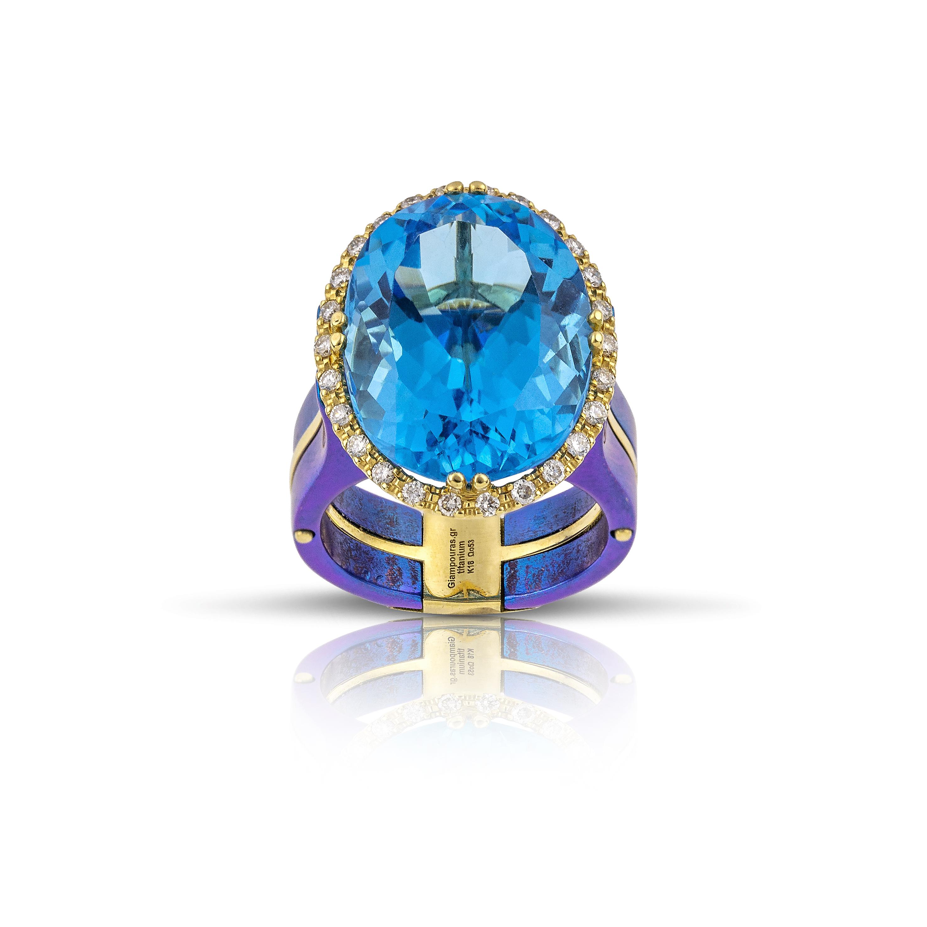 Blue Oval Topaz Ring by Vasilis Giampouras at Second Petale Gallery
Our Royal Elegance Titanium Blue Ring, where in its center lies a captivating oval-shaped blue topaz, exudes an enchanting azure hue that mesmerizes the senses. Encircled by a