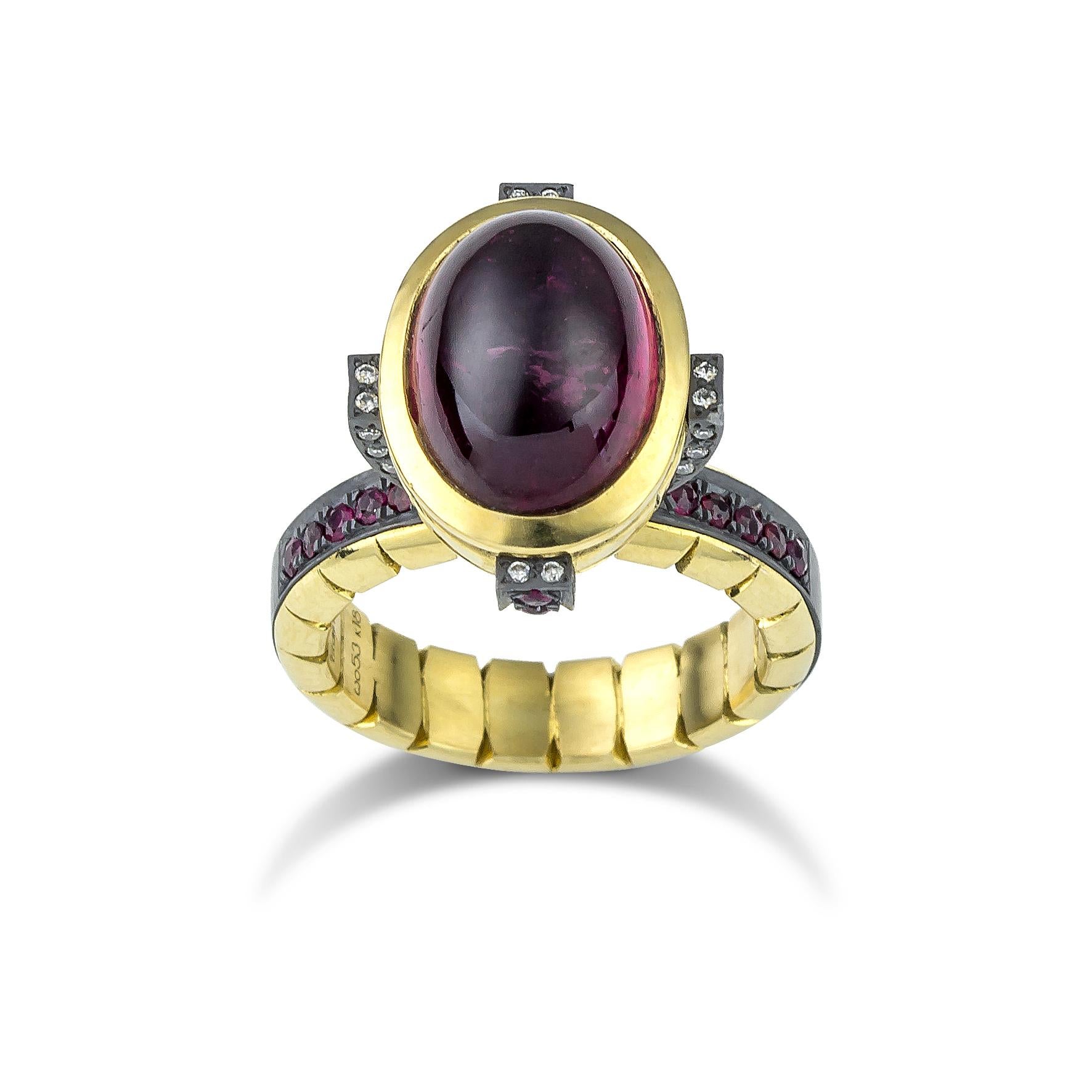 Tourmaline Cocktail Ring by Vasilis Giampouras at Second Petale Gallery
The oval tourmaline takes center stage, exuding its captivating charm and radiance. The rubies and diamonds add a touch of fiery brilliance and timeless elegance. Each gemstone
