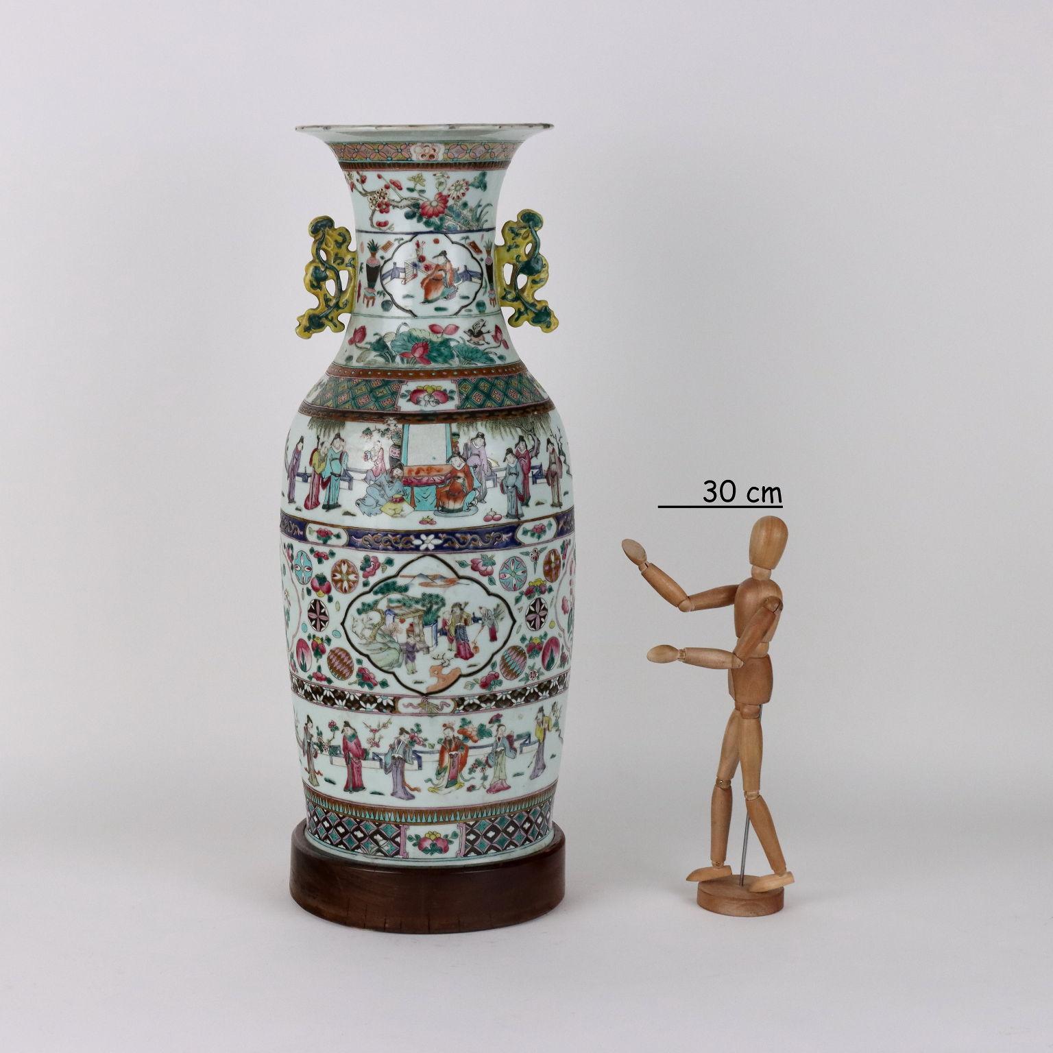 Large baluster porcelain vase decorated with polychrome glazes in horizontal bands with scenes of courtly life interspersed with geometric bands and lozenges. Lingzhi mushroom-shaped side loops. China Guangxu era (1875-1908).