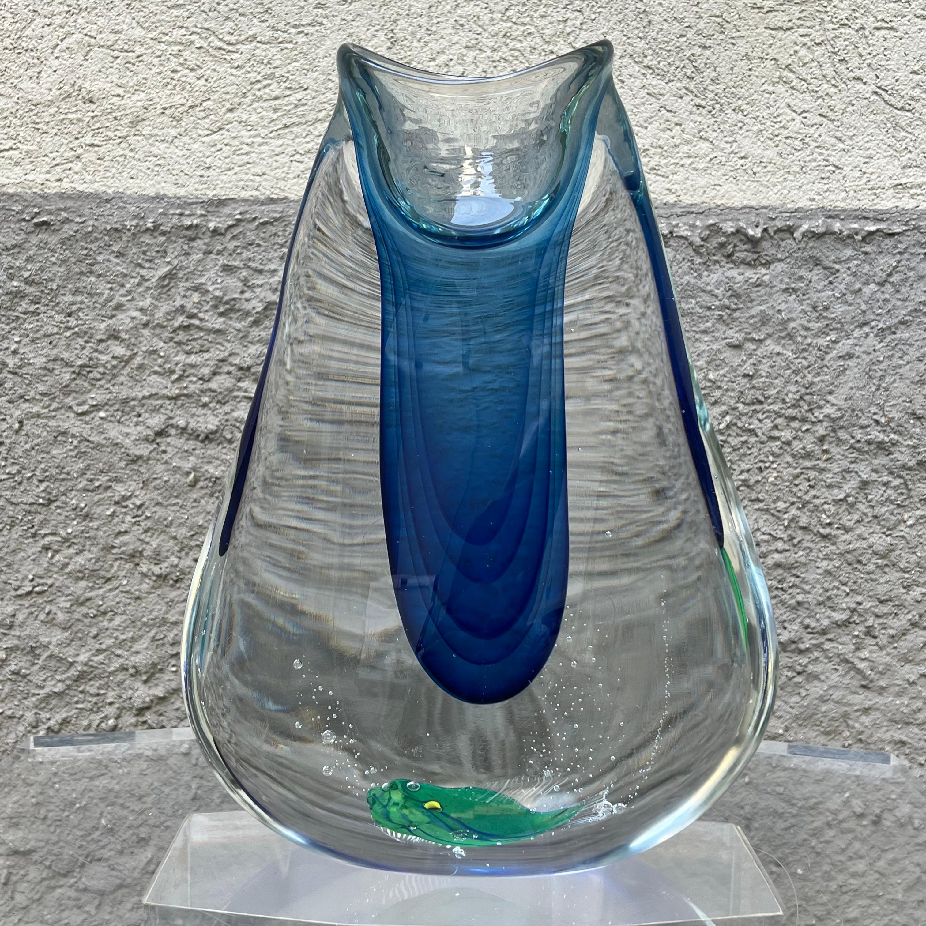 Exclusive submerged glass aquarium vase from the 1960s, attributable to renowned designer Flavio Poli for the renowned Seguso glassworks. This fine example of Murano art is distinguished by its extraordinary workmanship: clear glass encloses within