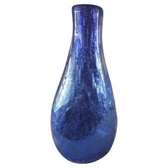 Vaso blu e foglia argento