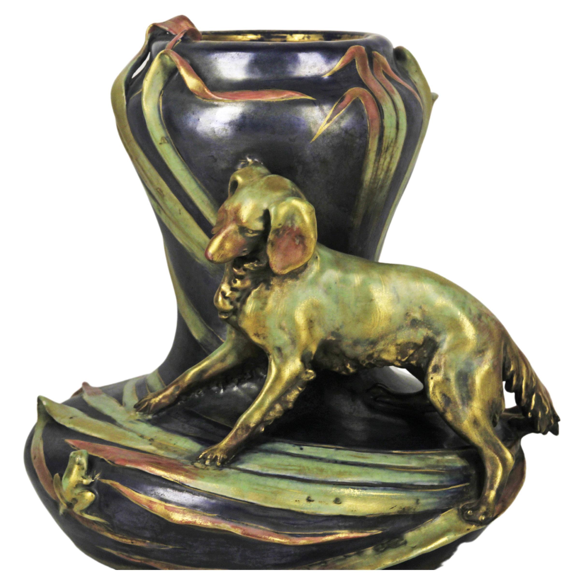 Art nouveau style ceramic vase Eduard Stellmacher
Glazed ceramic (glazed) with iridescent details
hunting dog and frog
Colors Green, Blue and Yellow
Origin Austria Circa 1900
Amphora Manufacture
Very good condition (small perforation on one side of