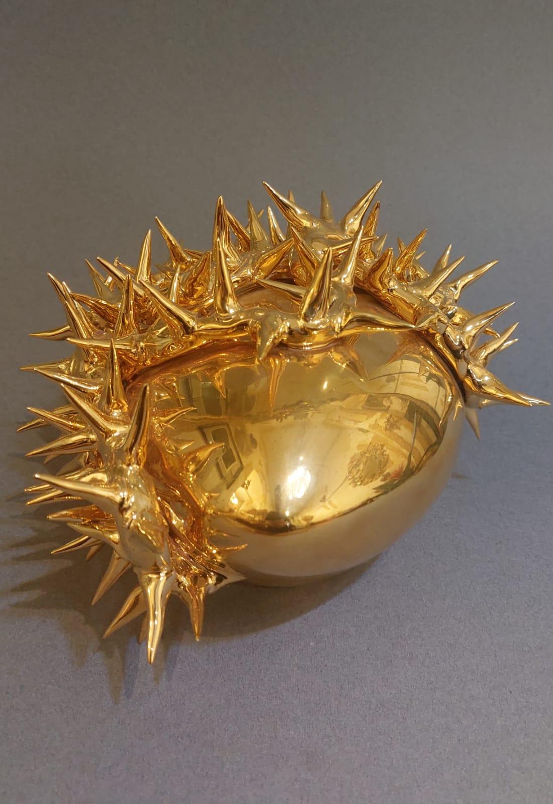 Fired Golden ceramic vase with heart-shaped design For Sale