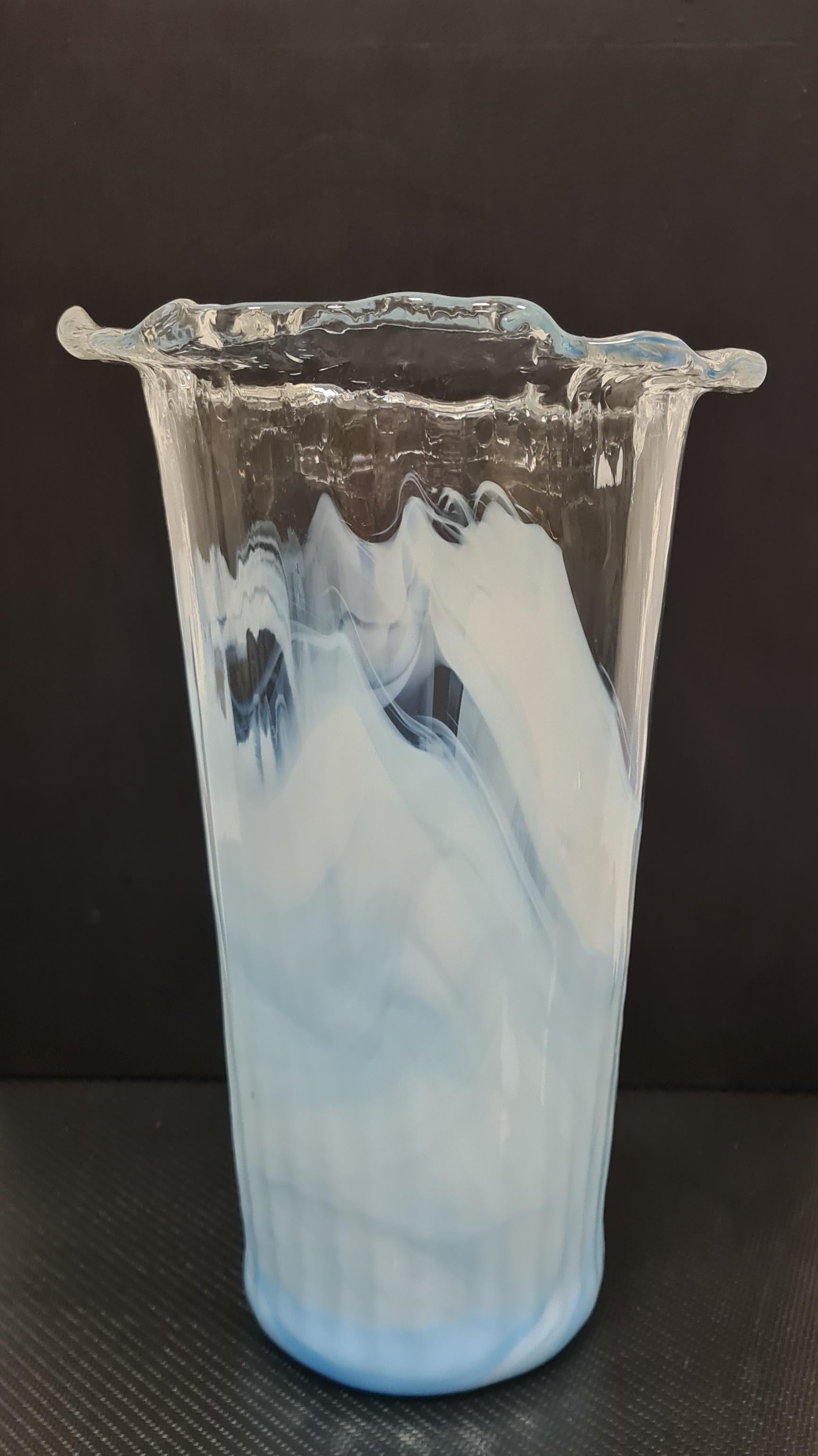 Murano art glass vase signed La Murrina.

Refined jagged-edge vase with a milk-blue glass base that gradually becomes transparent toward the rim.

Hand-blown this model was made in the 1980s' by the famous Venetian glassworks La Murrina whose