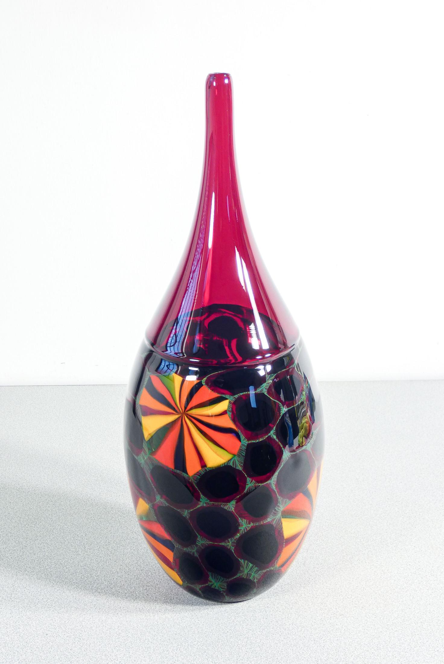 Vaso in vetro soffiato
policromo di Murano,
design Paolo CREPAX.

ORIGINE
Murano

PERIODO
Anni 90

DESIGNER
Paolo CREPAX

MATERIALI
Vetro soffiato di Murano, tecnica dell'incalmo

DIMENSIONI
Ø 17 cm
H 46.5 cm

CONDIZIONI
Perfette. Valutare