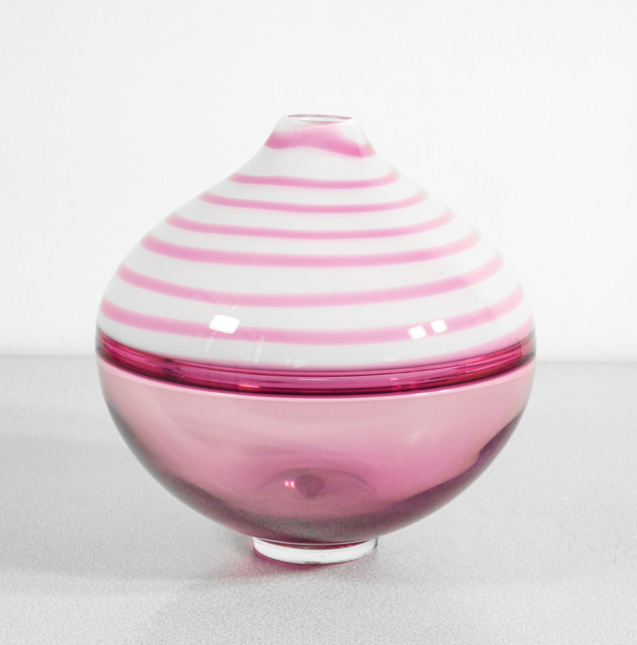 Blown glass vase
design Paolo CREPAX.
Pink version.

ORIGIN
Murano

PERIOD
1990s

DESIGNER
Paul CREPAX

MATERIALS
Murano blown glass, incalmo technique

DIMENSIONS
Ø 22.5 cm
H 24.5 cm

CONDITIONS
Perfette. Evaluate through the attached