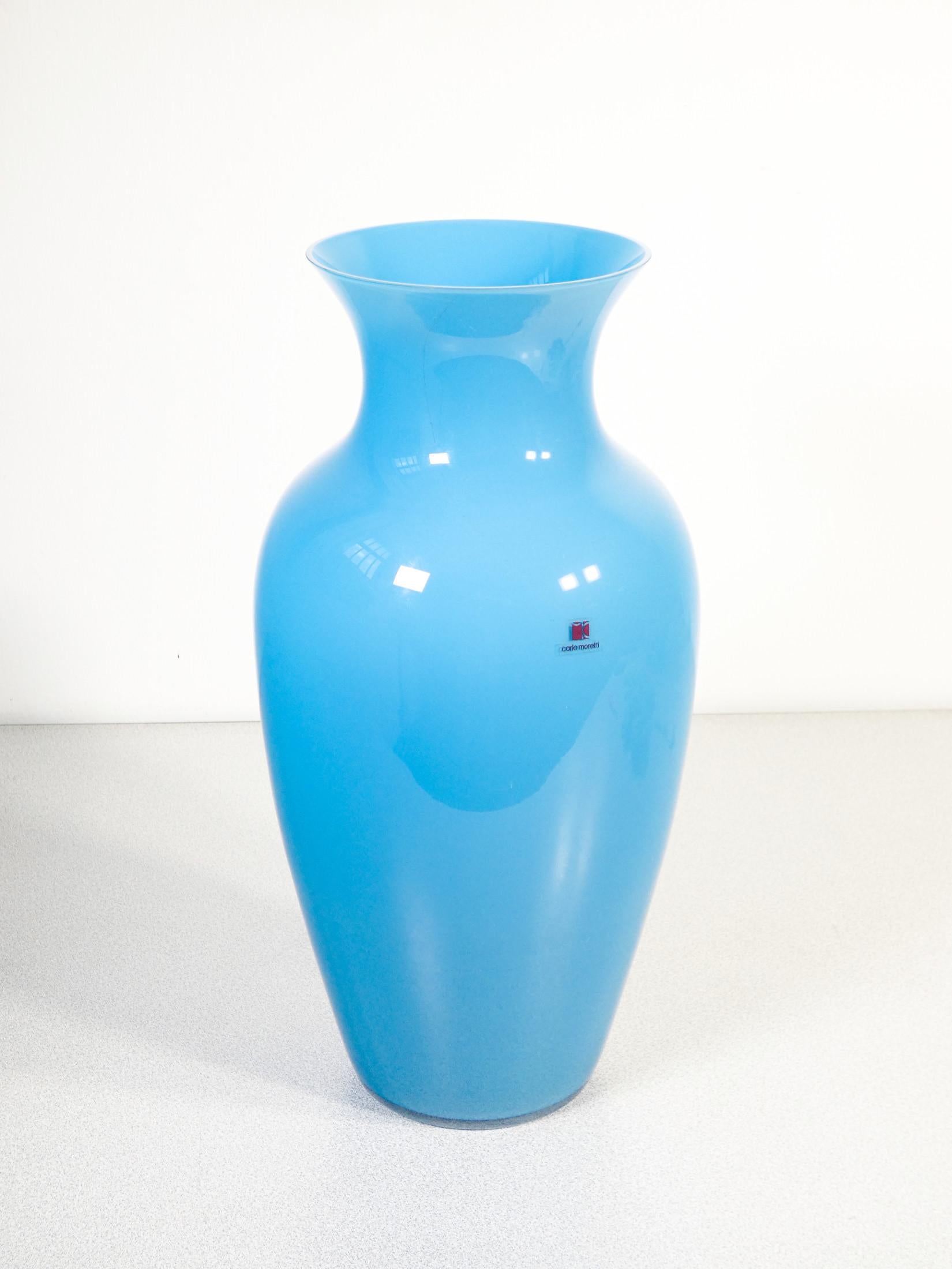 Blown glass vase
signed Carlo MORETTI,
chinese series.

ORIGIN
Italy

PERIOD
1970s

MARK
Charles MORETTI
Established in 1958 by brothers Carlo and Giovanni Moretti, it is a unique event in the glass island. It summarizes the characteristics of