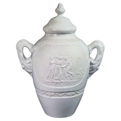 Retro LIMOGES vase made of biscuit ceramic and enamel, with bas-reliefs in classical style