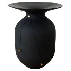 Black ceramic vase from the "Providers" collection.