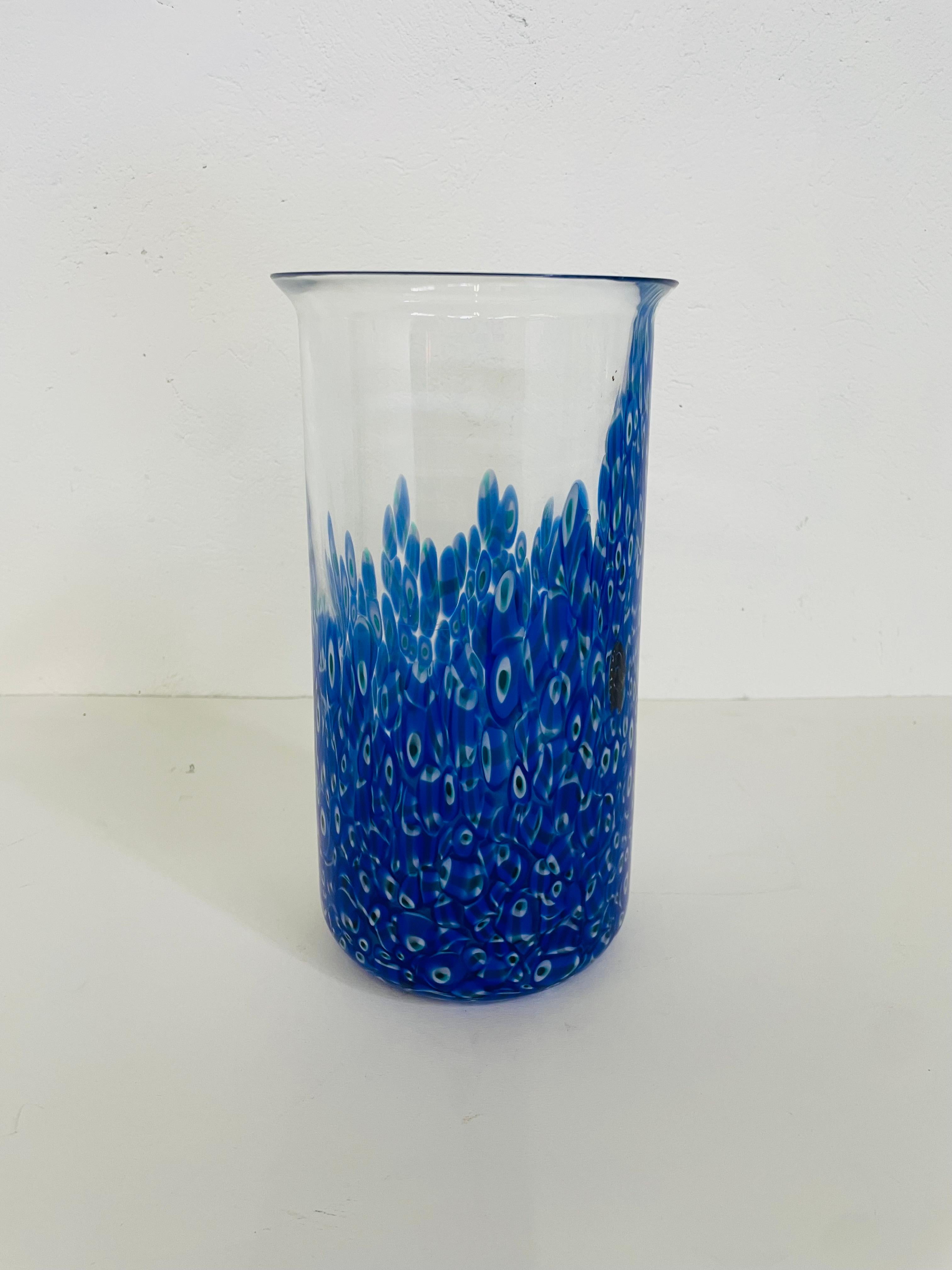 Beautiful vase model Neverrino, designed by Gae Aulenti and produced by Vistosi.
Produced in the 1970s, mterial colored and transparent glass.
In excellent condition as pictured.
Diemensions 26.5x14 cm diameter