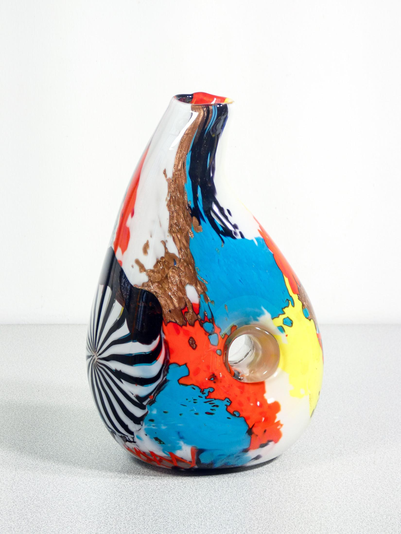 Oriente series vase,
design Dino MARTENS
for Aureliano TOSO,
in blown glass.

ORIGIN
Murano

PERIOD
1950s

DESIGNER
Dino MARTENS

MARK
Aureliano TOSO

MODEL
Specimen of the Oriente series

MATERIALS
Blown glass

DIMENSIONS
Hauteur : 28.5 cm
Width:-