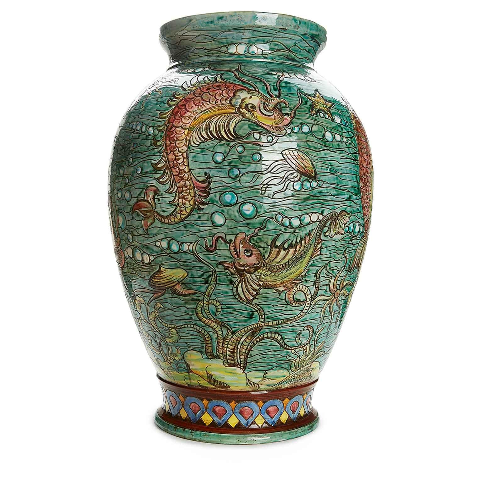 Italian Graffito Ceramic Umbrella Vase Decorated with Fishes and a Turquoise-Green Seabed habitat,  circa 1950. Large Umbrian-made ceramic vase as inferred from the graffito under the base Perugia Italy D625, is decorated in the colors of the