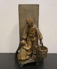 Painted terracotta sculpture vase