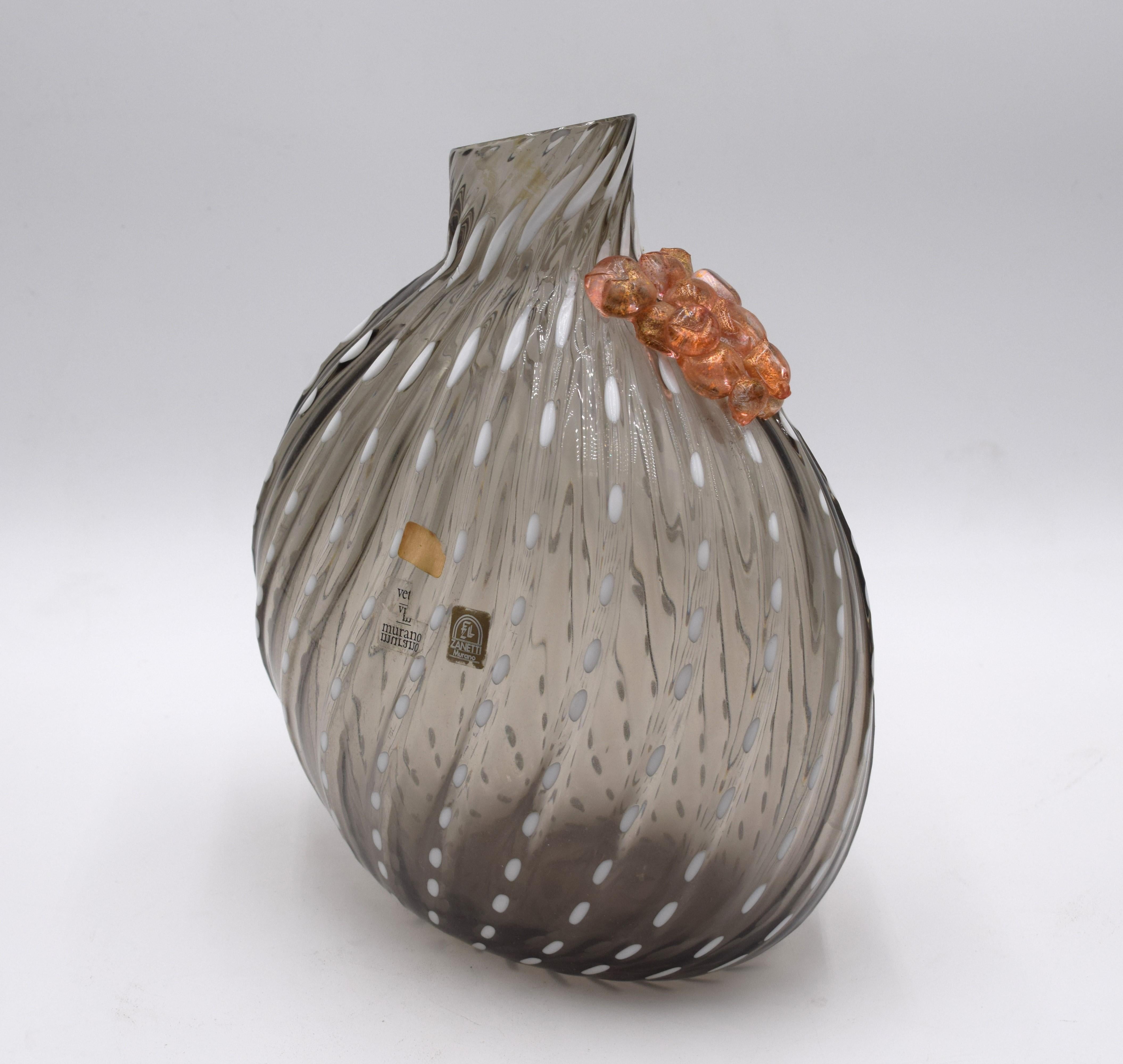 Vase in shades of gray Murano glass, Licio Zanetti production, circa 1970s.
Excellent condition, no missing or broken, see photos.
Dimensions: H= 29 cm; W= 21 cm; D= 13 cm.