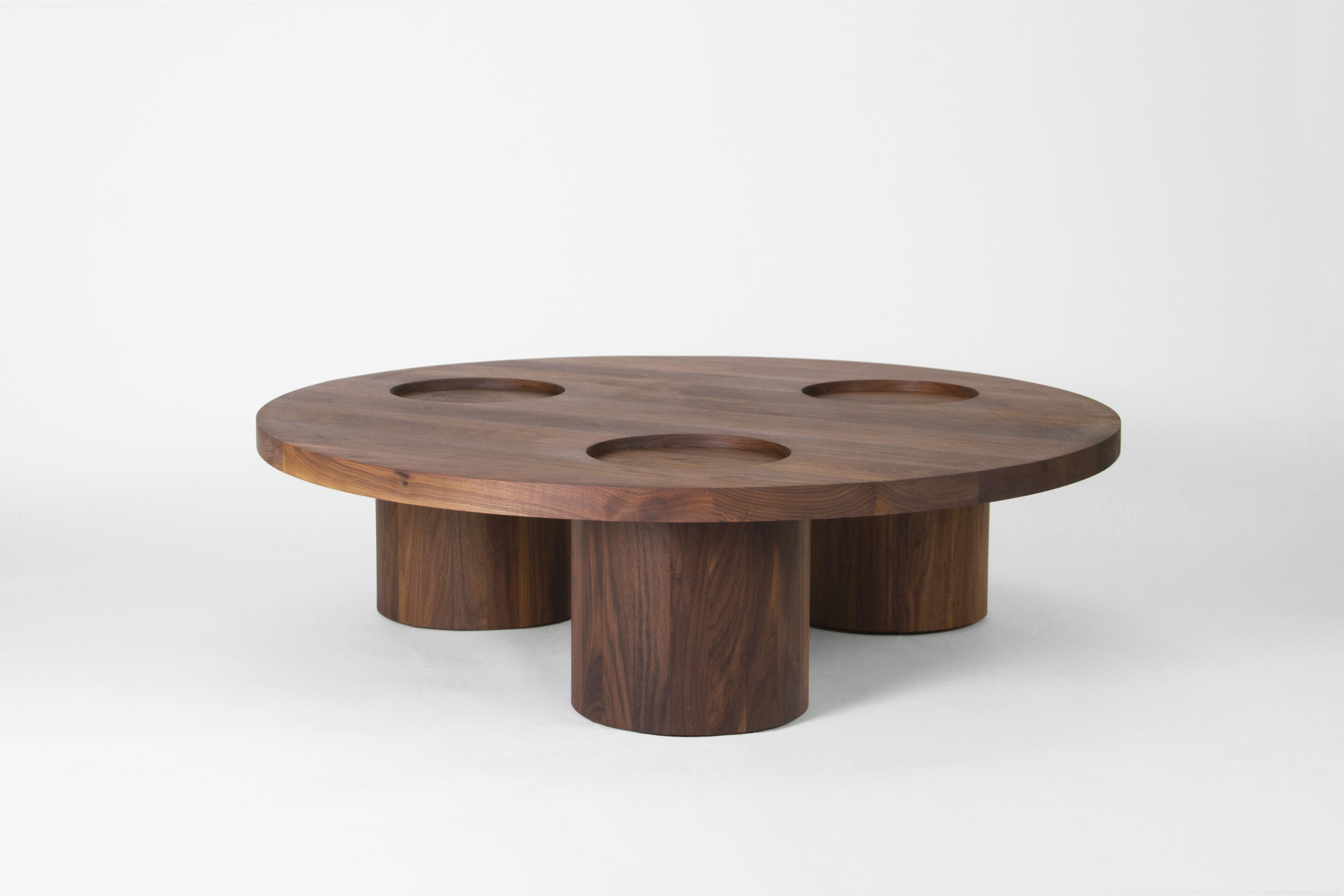 Vassoio coffee table in solid wood with circular insets and wide cylindrical legs.

Available in solid walnut, white oak, red oak, maple, ash or black stained ash.

Finished with a clear protective coating.

Designed and handmade in Los