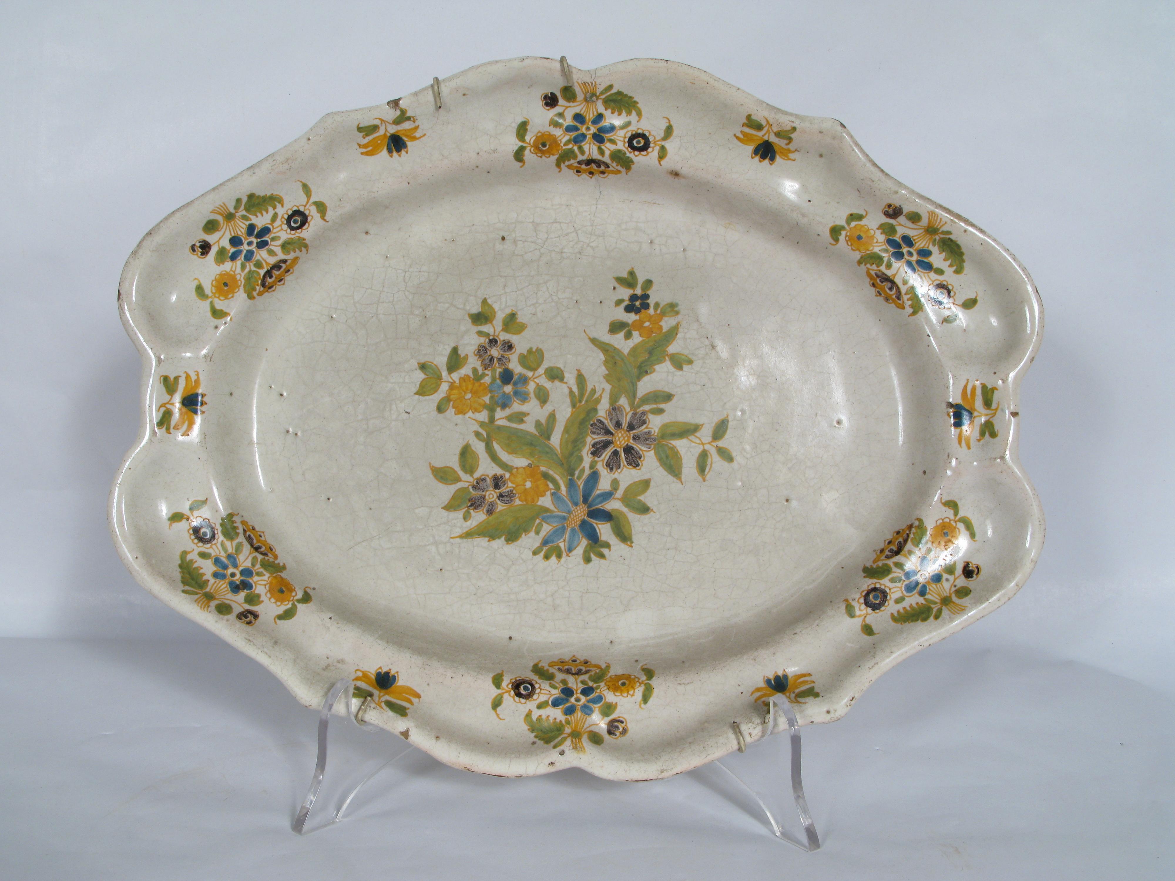 Majolica tray, Lombardy 19th century

Elegant majolica tray with mixtilinear border and floral decorations. 

Dimensions 36.7 x 28 x 4 cm

The work, like any of our other objects, will be sold accompanied by a certificate of authenticity.

In case