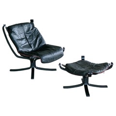 Vatne Falcon Lounge Chair with Ottoman in Black Leather and Red Piping