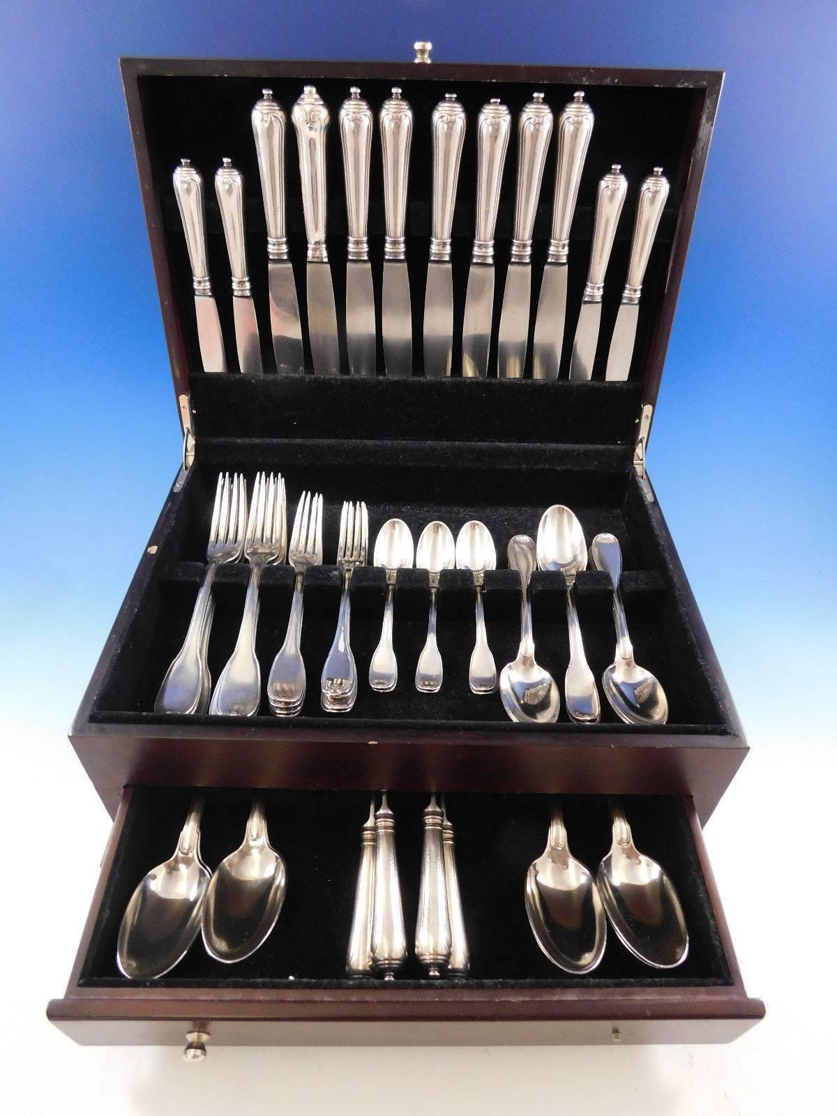 Dinner and luncheon size Vauban by Puiforcat French sterling silver flatware set, 64 pieces. This set includes: Eight dinner size knives, 9 3/4