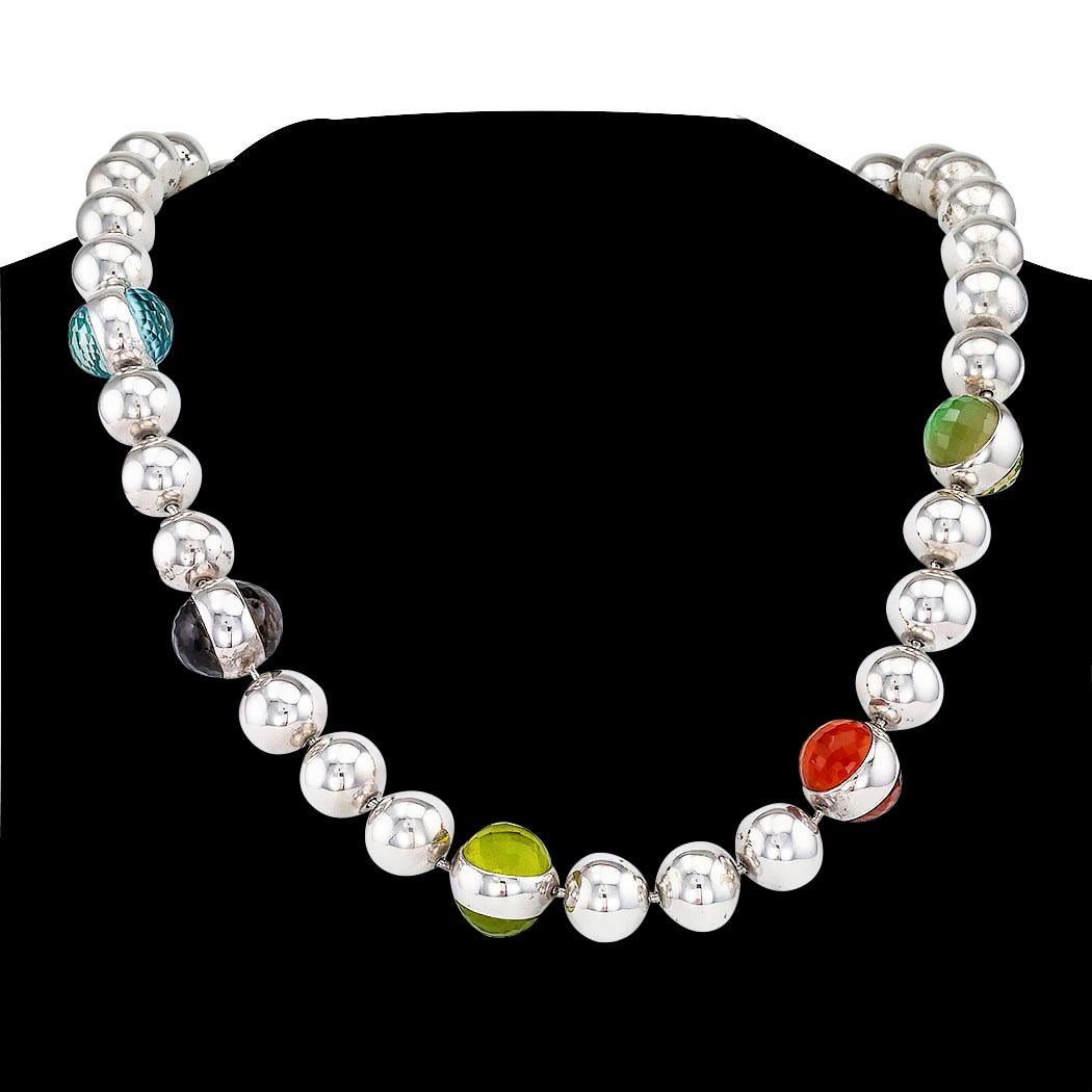 Vaubel sterling silver and quartz bead necklace with three length adjustments circa 2011.

SPECIFICATIONS: 

MATERIALS:  faceted quartz half beads with color backing.

METAL:  sterling silver.

Weight:  76.2 grams.

HALLMARKS:  signed