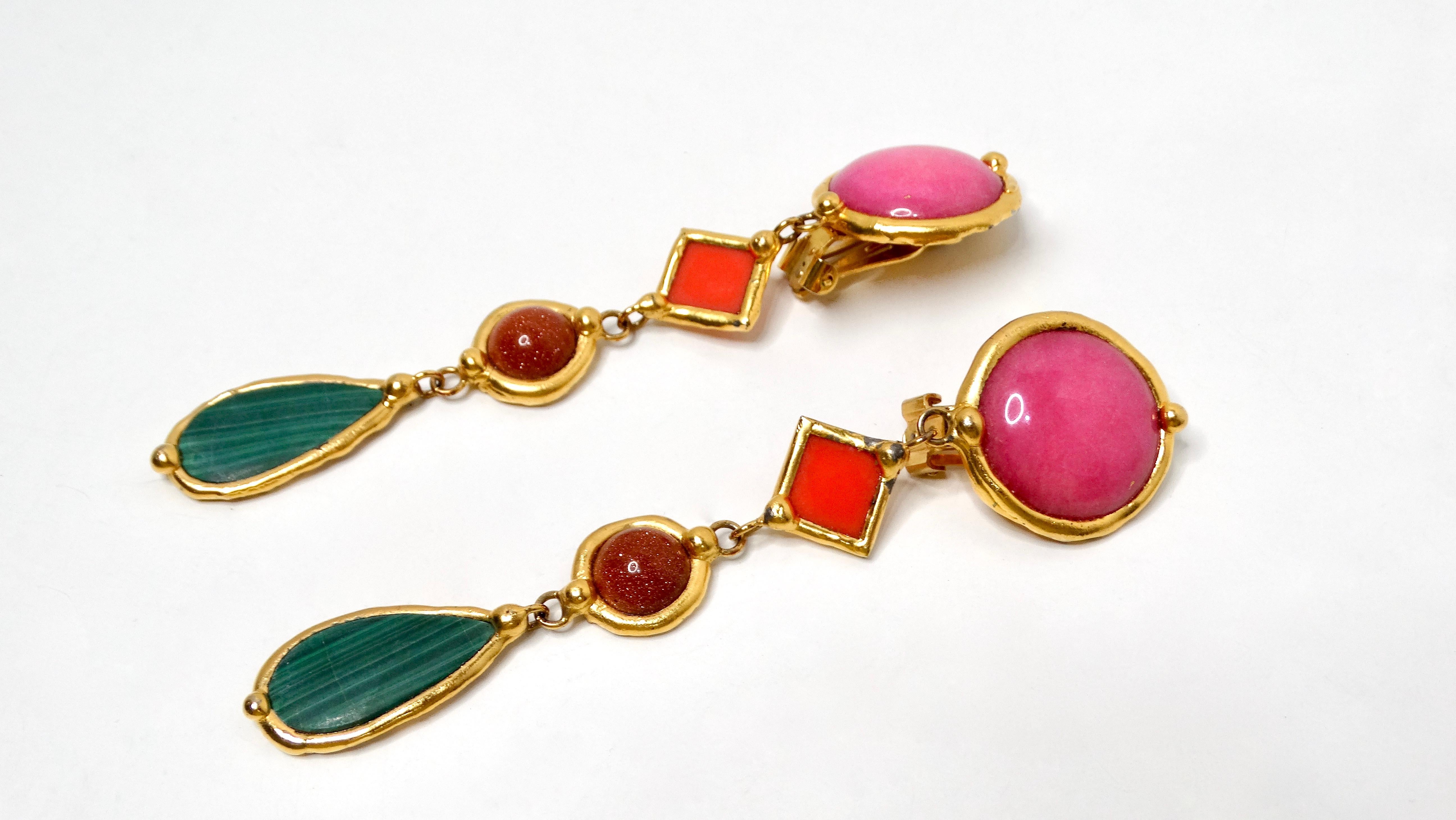 Introducing the exquisite Vauquelin Handmade French Multicolor 18k Gold Plated Dangle Clip-On Earrings, a true statement piece that embodies elegance and artistry. These earrings feature a vibrant array of four different colored costume stones, each