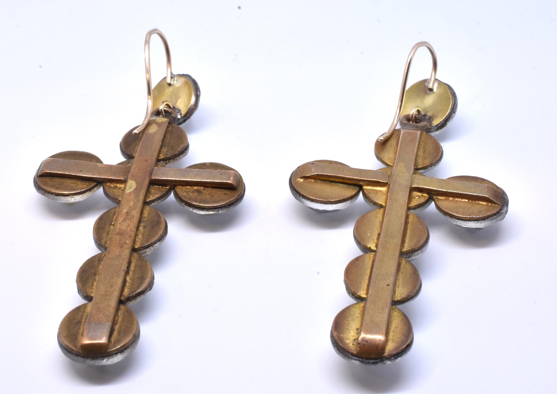 Our glass earrings,  in the form of a Latin crosses, are made of Vauxhall glass, popular as jewelry in the 1860's and sold along the pleasure Gardens in Chelsea, where courting couples strolled on summer evenings. Made by skilled artisans who were