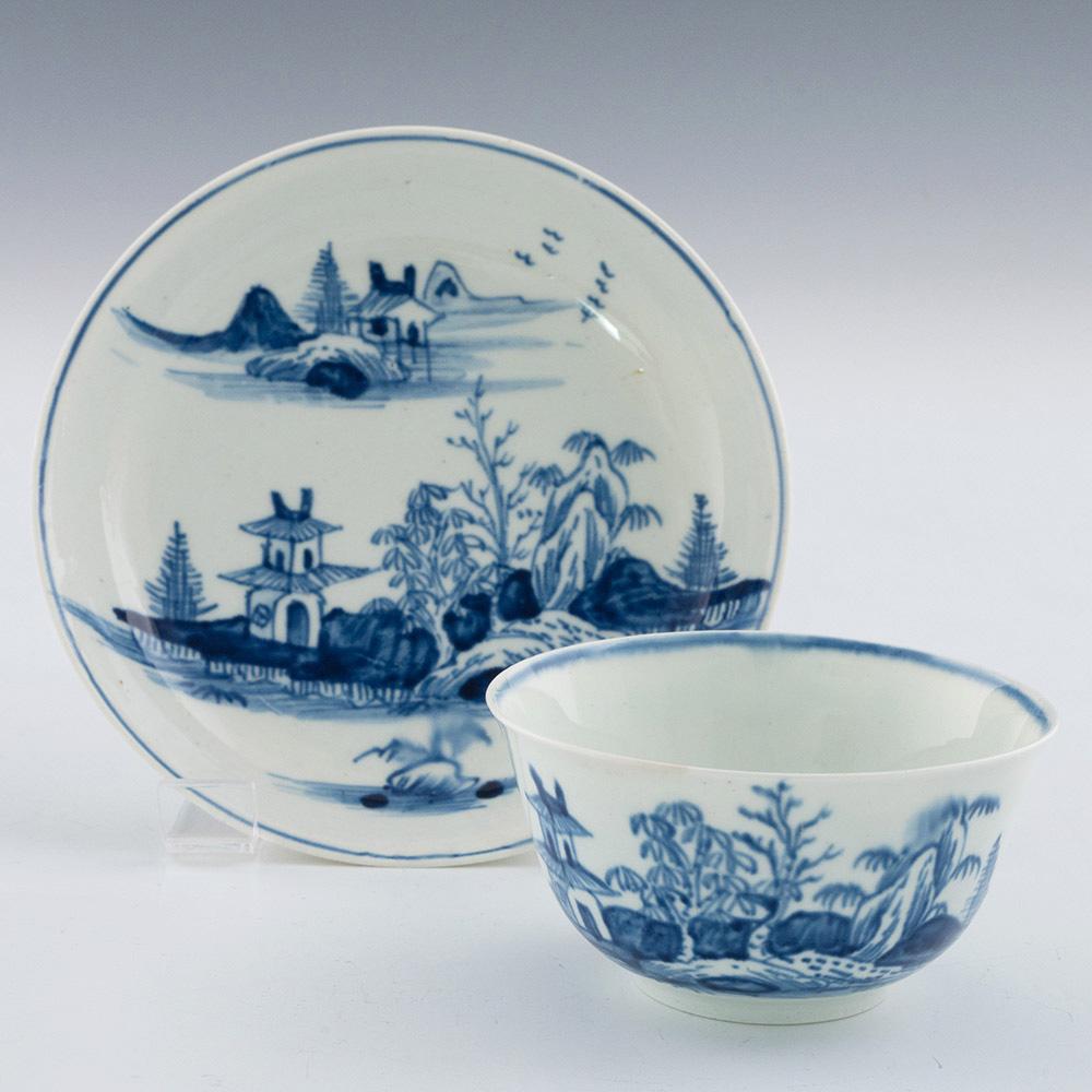 Heading :A Rare Vauxhall porcelain Tea bowl and Saucer
Date : 1755-1760
Period :George 11
Marks :None
Origin :Vauxhall London
Colour :Underglaze blue on white
Pattern : Oriental style featuring a pagoda on island variant.
Features : The inner rim