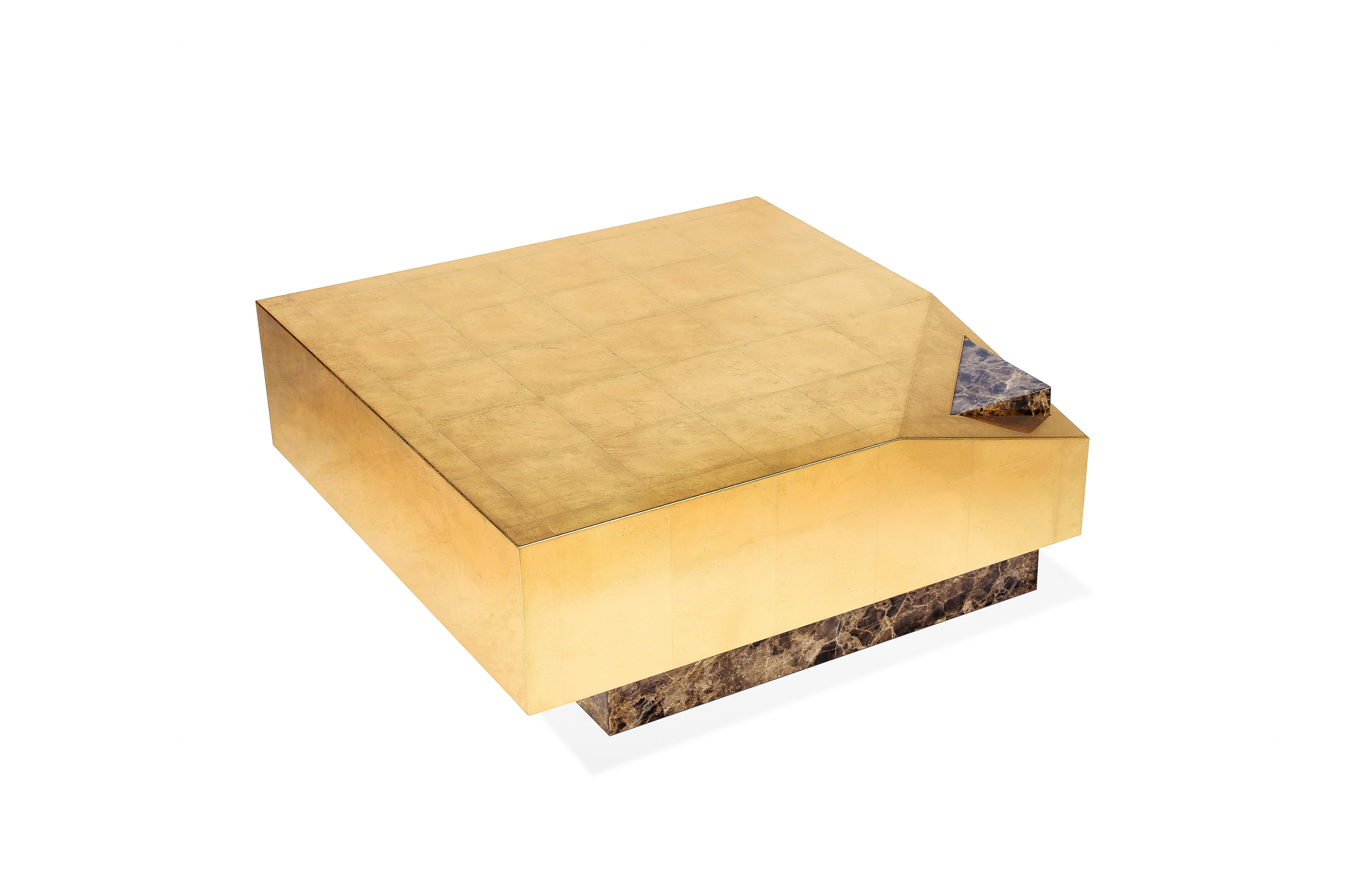 Vaz center table by Royal Stranger
Dimensions: 80 x 80 x 32 cm
Materials: Emperador Marble with polished finish with gold leaf top with glossy finish.

Inspired by the merchant marine and the Portuguese Discoveries, the Vaz center table is born