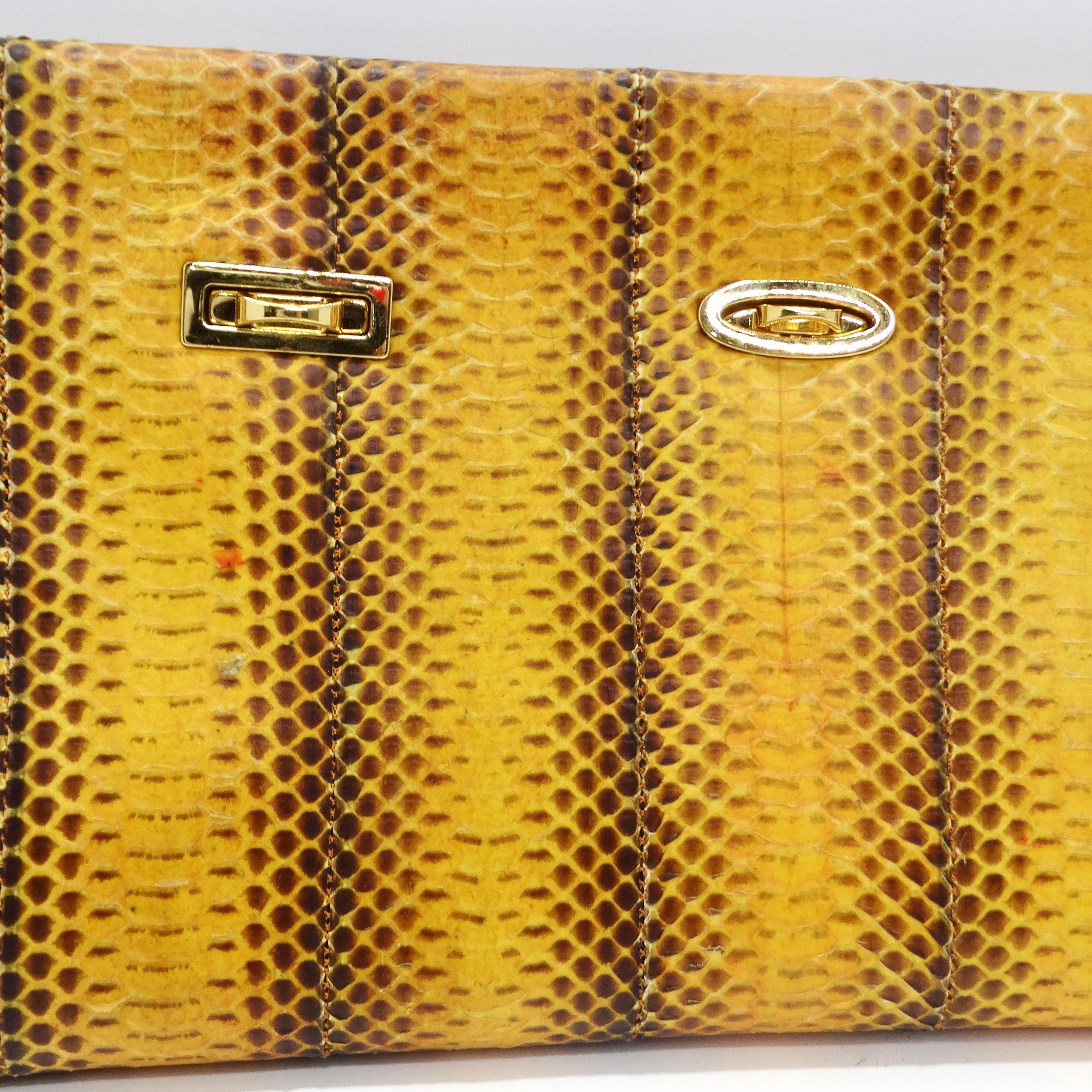 Introducing the stunning VBH 1980s Yellow Snakeskin Embossed Leather Clutch, a truly special and eye-catching accessory that epitomizes the bold and vibrant style of the 1980s. Handmade and limited edition, this clutch is a unique piece that is sure