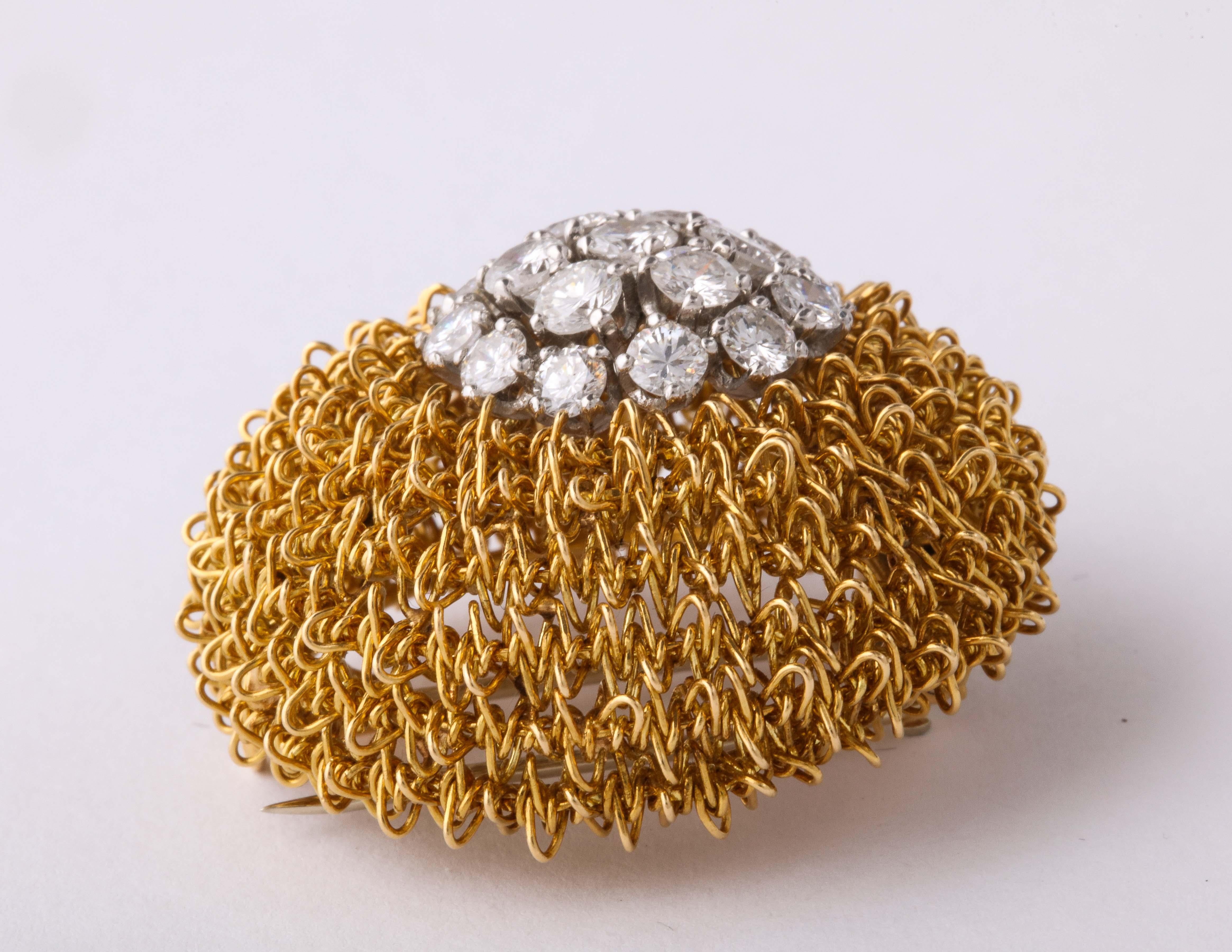 Elegant and super chic for that late afternoon Cocktail at The Ritz.   18kt Woven Gold Pin with 19 clean & very white Full Cut Diamonds - prong set - and slightly asymmetrically set on the Clip.  Around 4 carats total.  Marked VCA 6518K  Made in