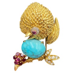 VCA 1960s 18k gold, turquoise, ruby and diamond chick brooch
